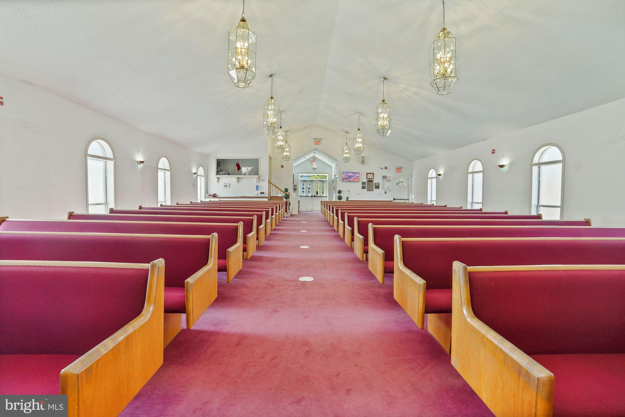 This beautiful Church is nestled in Takoma Park, Maryland.  The property seats approximately 400 and boasts two levels, with three bathrooms.   The service area has ample lighting and includes a front stage and audio room.  Natural light brightens the space with tall ceilings and wide aisles.  The basement level includes multiple classrooms, a Pastor's office, storage, and a kitchenette.  It is approximately 1 block from the future purple line station, making metro accessibility at your fingertips.  The church has been well maintained and is ready for a new congregation or developers looking for a great area. Owner financing available.
