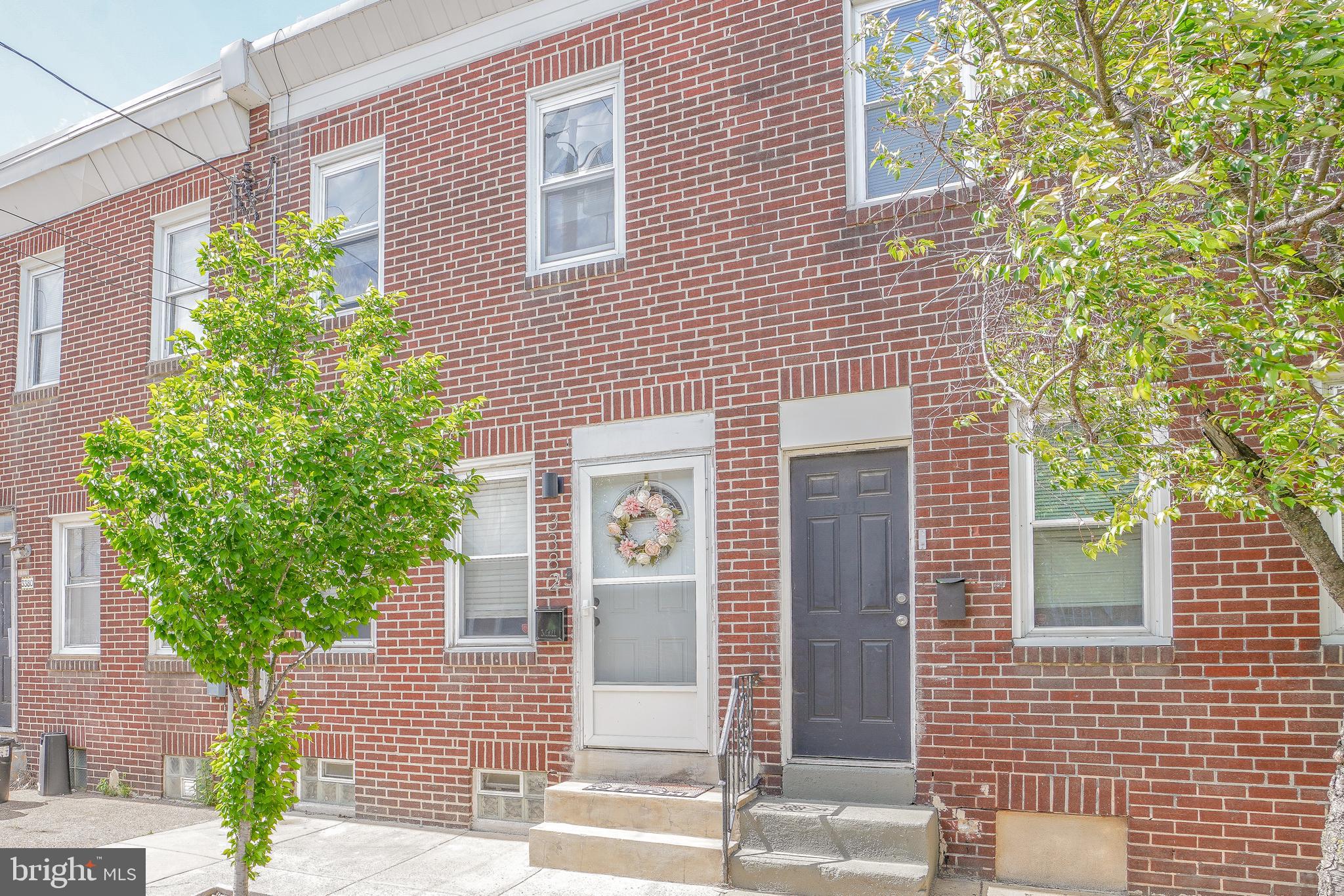 Beautiful & well maintained, 2 bdrm 1.5 bath townhouse in Port Richmond.  Living rm & Dining rm combo/open floor concept with laminate hardwood floors, ceiling fan, chandelier & recess lights.  Updated kitchen with white cabinets,  subway tile backsplash, ceramic tile floor, new counter top, ss sink, new dishwasher, built in microwave, GE electric cook top, recess lighting  and Frigidaire refrigerator (included).  Custom wood accents throughout including the bar in kitchen.  Back kitchen door leads out to a small private rear patio with flowering greenery, hose & motion lights.  Off the dining room is a convenient 1st floor powder room with pedestal sink.  Lower level:  Nicely finished fam room,  office or play room with vinyl hardwood floors.  Bonus storage room/laundry rm with washer and dryer hook ups.  2nd flr features:  New iron railing leading up the stairs, master bedroom and new  master bath with dual access to hall bath,  custom ceramic tile shower and floor,  beautiful new glass sliding shower doors, new sink, vanity, light up LED medicine cabinet & Bluetooth speaker in overhead light.   Gorgeous newly restored original hardwood floors  & recess lights on the 2nd flr, cute 2nd bdrm with ceiling fan.  Dimming lights in most of the rooms,  custom blinds throughout,  all new 6 panel interior doors, new front and back door, replacement windows, new sewer line  to the street 2017, 4 zone split HVAC system.  Great heat and air conditioning  when and where it's needed.  Beautiful Cherry Blossom tree newly planted at the front walkway.  Quick settlement is available.  Great location, near all major highways, bridges, center city, New CVS & Planet Fitness.