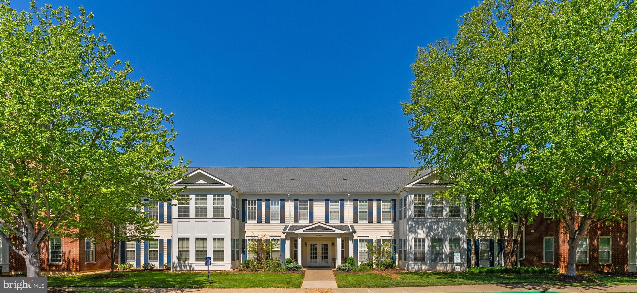 Come see all Warrenton has to offer while living in The Suffield Meadows Community. This 55+ community is located on the DC side of Warrenton. This 2 bedroom 2 full bath plus Den (other room) first floor condo is spacious with fresh paint, LVP flooring. The open concept layout  in this unit naturally continues to the living room, dining and kitchen area and the bright sunroom is surrounded by windows on each side for lots of natural light and custom Levolor window blinds throughout the condo.  The updated kitchen offers stainless steel appliances, ceramic tile backsplash, a breakfast nook for extra seating or cooking prep space, upgraded cabinets and countertops. The spacious primary suite offers a large walk-in closet with a luxurious bathroom offering a double vanity, vanity desk, separate soaking tub and separate glass enclosed shower. The secondary bedroom  and  the multi-purpose den (other room) offer lots of space and could make a nice office or guest room(s). Separate laundry room (washer & dryer convey) . At the entrance of the building, a security code allows access to the attractive main level common area with fireplace and seating area, mailboxes and elevator. One parking space in the garage and a separate storage space in the basement of the other condo building convey. Enjoy all the beauty this Suffield Meadows Community has to offer with paved and unpaved walking nature trails with meadow views, preserved wetlands, and a bird sanctuary, outdoor pool, fitness center, clubhouse with library and ample visitor parking. Welcome to the Suffield Meadows Community in Warrenton! Easy living with access to Warrenton and beyond!