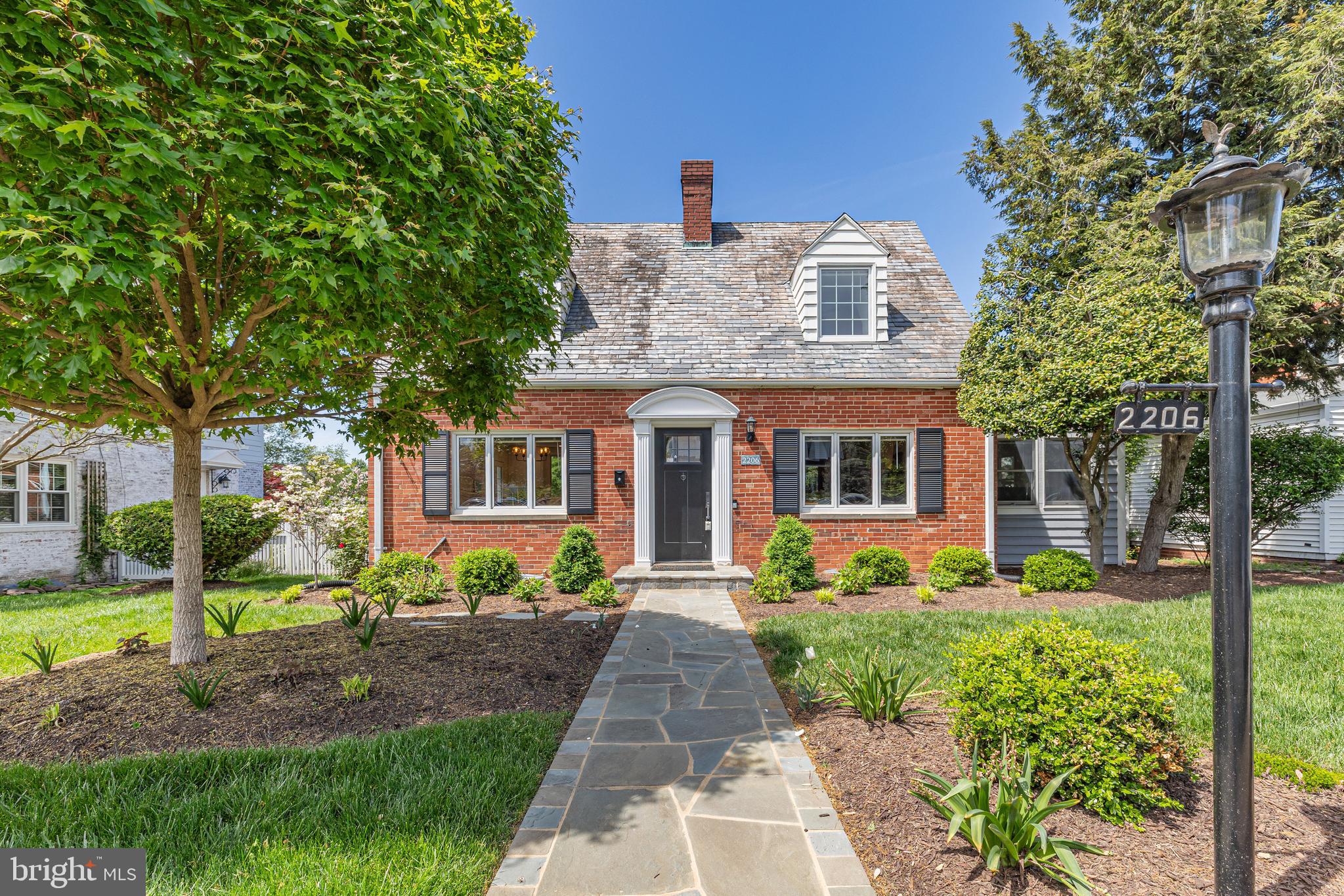 OFFERS DUE TUESDAY, APRIL 29 BY 10AM. Nestled on a quiet, tree-lined street in the heart of Alexandria, this beautifully renovated all brick 3 level Cape Cod in 2022 offers the perfect blend of classic charm and modern updates. With 3 bedrooms plus a versatile den/office, this sun-filled home welcomes you with original character and stunning refinished hardwood floors (2022) throughout. The open-concept kitchen, renovated in 2022, features stainless steel appliances, sleek quartz countertops, and custom cabinetry. It seamlessly flows into the inviting dining room, where two bay windows and original built-in corner cabinets add timeless appeal. The spacious living room is anchored by a cozy wood-burning fireplace, and just beyond, the bright den/office offers French doors leading to a large updated deck, new stone patio (2022) and beautifully maintained backyard — ideal for entertaining or quiet relaxation. The sunroom, complete with heated floors, is perfect for year-round enjoyment as an office, reading nook, or lounge. The main level also includes a stylishly updated half bath (2022) and a convenient main-floor bedroom. Upstairs, you’ll find two generously sized bedrooms and an updated full bath, offering comfort and space for everyone. Downstairs, the finished lower level provides endless possibilities — think media room, playroom, or guest retreat — with a full bath and direct walk-up access to the fully fenced backyard. Slate Roof. Located just moments from Bradlee Shopping Center and Chinquapin Park, and with quick access to Crystal City, Amazon HQ, and major routes like I-395, this home makes commuting to DC, the Pentagon, or Old Town a breeze. This home truly has it all — thoughtful updates, prime location, and undeniable charm. A perfect 10!  **Sellers have never used the fireplace while living there**