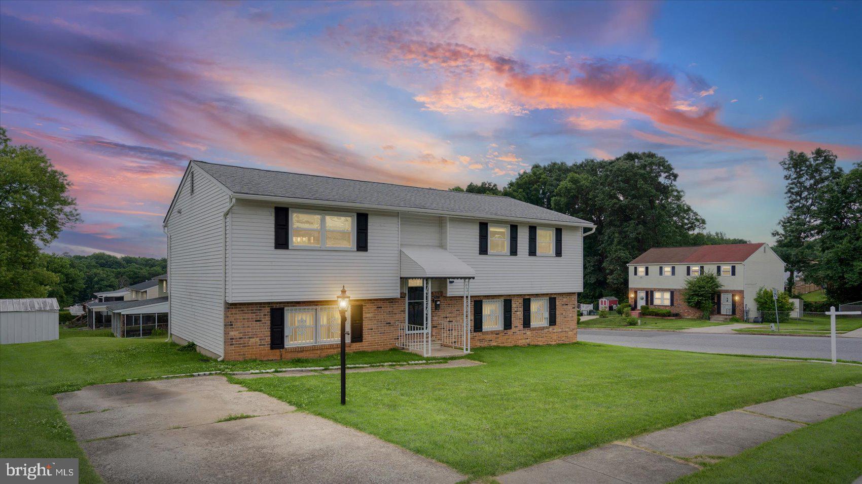 This pristinely maintained, move-in-ready 3BR/2.5BA split foyer home is on a manicured corner lot in the quiet neighborhood of Deerfield.  Park in your private driveway just steps away from the front door of your new home. Step into the foyer, where steps lead up to the main living areas or down to the additional living space. This home features abundant natural light, easy care flooring, and recessed lighting.  The open concept main living area features a spacious living room open to the dining room and a stunning kitchen.  The kitchen boasts abundant ceiling-height cabinets, granite countertops, stainless steel appliances, a deep sink under a window, and an island with pendant lights and breakfast seating.  Down the hall is an updated full bath with a deep tub, two sizable secondary bedrooms, and a primary suite featuring a private en-suite with a walk-in shower.  The lower level offers additional living space with above grade windows, a spacious recreation room, laundry, storage, utilities, and sliding doors to a patio in the amazing yard.  The yard features a carpet of green grass with a shed and many possibilities.  This home is move-in ready, ideal for any new homeowner, and is located close to shopping, restaurants, and commuter routes.