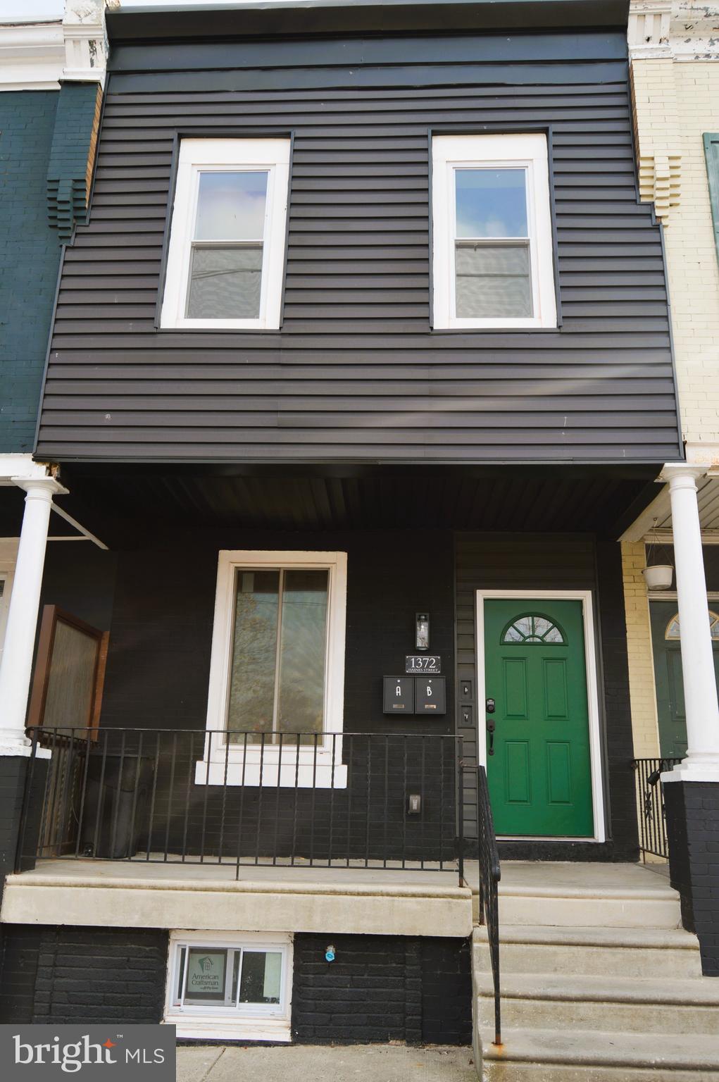 Welcome to this great newly renovated 2nd floor apartment of a duplex located just outside of West Oak Lane! Walk up to see the shared front porch. Through the front door you are welcomed to Unit #B up the stairs, exposed and sealed brick throughout the unit greats you as you walk up the stairs. Great kitchen space; complete with neutral in color LVP flooring throughout the unit, recessed LED lighting, large pantry closet, upgraded stainless steel appliances, ceramic tile backsplash, tasteful granite counters, and great storage space in all of the new white cabinets, while the black fixtures accentuate the granite and back splash colors. The front of the unit you will find a large bedroom with 2 windows, exposed and sealed brick wall, recessed lighting, and large closet with lighting. Continue down the hall where you will find the new bathroom, with ceramic tile floors, tiled shower/tub combo, spacious vanity with mirror and upgraded fixtures. Just outside the bathroom is the stackable front loader washer/dryer making it convenient for laundry in your own unit. The back bedroom is similar to the front bedroom with 2 windows, exposed and sealed brick wall, large closet with lighting, and recessed LED lighting.  All new paint throughout, LED lighting, flooring, drywall/sheetrock. Convenient to multiple modes of public transit and most major routes, and walkable to nearby parks and shopping as well as the Awbury Arboretum. Stop by today and see for yourself and live in this luxuriously remodeled unit!