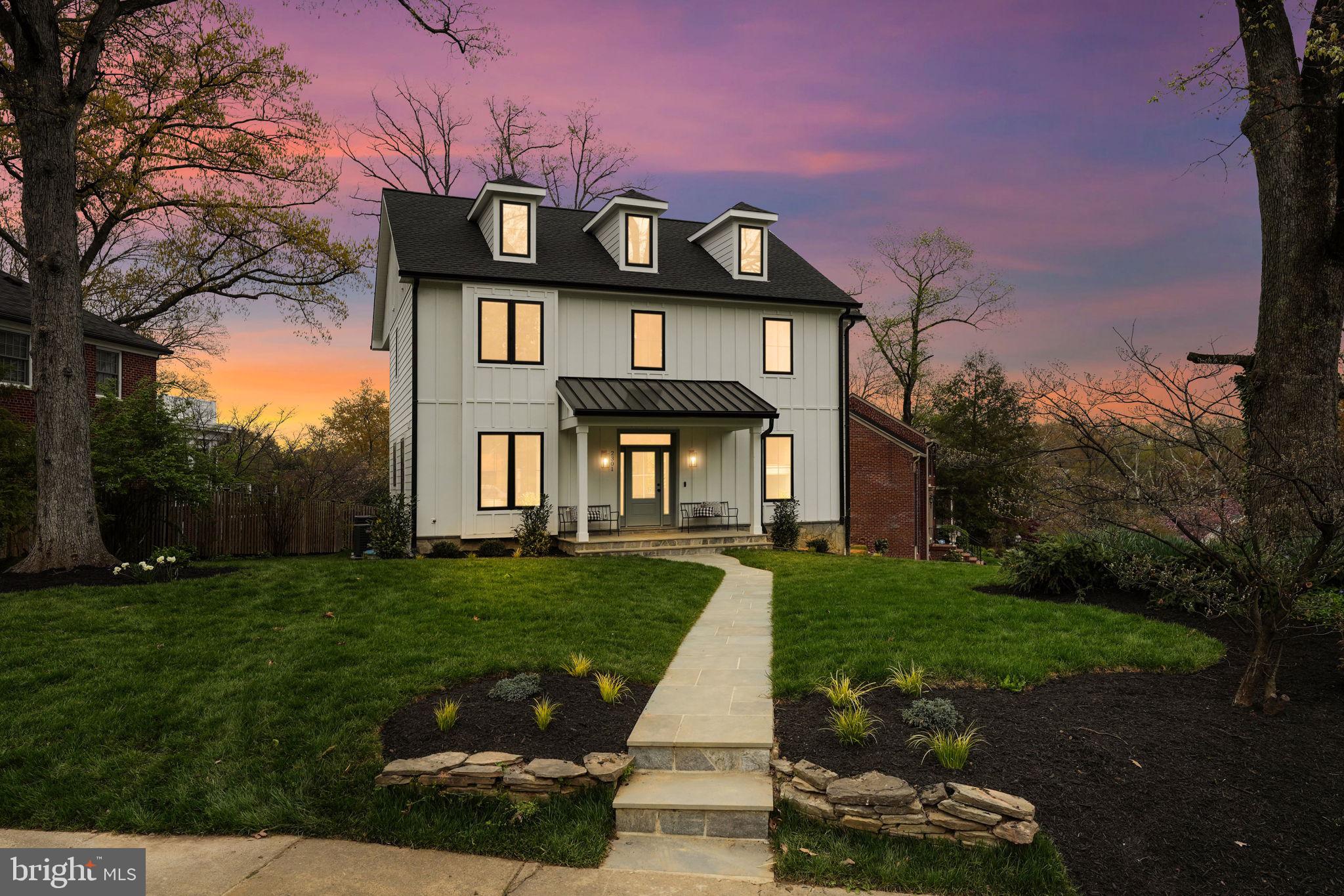Welcome to your dream home in the sought-after Braddock Heights neighborhood of Alexandria City! This stunning residence offers the epitome of modern living, boasting a complete top-to-bottom transformation and a prime corner lot location. Prepare to be enchanted by the spacious, open floor plan flooded with natural light streaming through expansive walls of windows and enhanced by soaring ceilings. Step inside and be greeted by freshly painted walls and luxurious natural oak wide hardwood flooring gracing both the main and upper levels. The integrated Sonos system with built-in speakers sets the perfect ambiance for any occasion, whether you're hosting a lively gathering or enjoying a quiet evening at home. The heart of the home is undoubtedly the gourmet kitchen, where culinary aspirations come to life. Showcasing a double-wide large island illuminated by chic white and gold shade pendant lighting, exquisite white with grey vein quartz countertops, and ample shaker cabinets, this space is as functional as it is stylish. High-end stainless steel appliances, including a gas range with range hood, pot-filler, 42" refrigerator, dishwasher, walk-in pantry, and a sleek tile backsplash, complete the picture of culinary perfection. Entertaining is a breeze with the separate dining and living areas, where a cozy modern gas fireplace and convenient wet bar with sink and mini-fridge await. Whether hosting intimate dinner parties or lively get-togethers, this home effortlessly caters to your every need. Off the living area through the rear sliding glass doors is a new 16 X 10 trek deck, providing a perfect spot for outdoor relaxation and enjoyment. Retreat to the upper level, where the owner's suite beckons with a tray ceiling, two walk-in closets, and a spa-like luxury bath featuring a double vanity and rejuvenating spa shower. A junior suite with a posh full bath, two additional generously sized bedrooms, and a third lavish full bath ensure ample space for family and guests, while a convenient laundry room with a full-size washer and dryer adds everyday convenience on this level. The fully finished basement offers endless possibilities for recreation and relaxation, complete with a spacious recreation area and an additional bedroom with a full bath. With a 2-car side-load garage and a sprawling yard with a rear fence, this home offers the perfect blend of indoor and outdoor living. Conveniently located just moments from shops, dining, grocery stores, INOVA Hospital, Del Ray, Old Town Alexandria, The Pentagon, Shirlington, Washington DC, and Reagan National Airport, this home offers unparalleled convenience. Plus, with both Braddock and King Street Metro stations just a few miles away, commuting is a breeze. Welcome home to luxury living at its finest!