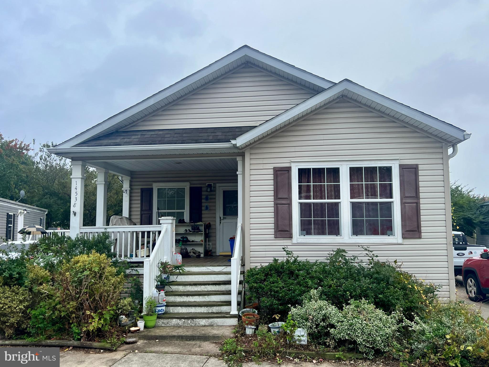 This property requires the owner to pay $1,878/month in ground/land rent. Can be rented out right away for instant cash flow. This 3-bedroom, 2-bath manufactured home offers a comfortable layout with wood, tile and carpet flooring throughout. The living area features a cozy fireplace, and the spacious kitchen provides plenty of room for cooking and gathering. The laundry room includes a new washer and dryer, and the A/C unit was replaced in 2024 for added comfort and reliability. Home needs some TLC.

A long driveway provides ample parking space, and the community offers great amenities including a clubhouse, exercise room, basketball courts, and a pool. Conveniently located near Lee Jackson Highway and Route 28, this home offers easy access to shopping, dining, and commuter routes.
