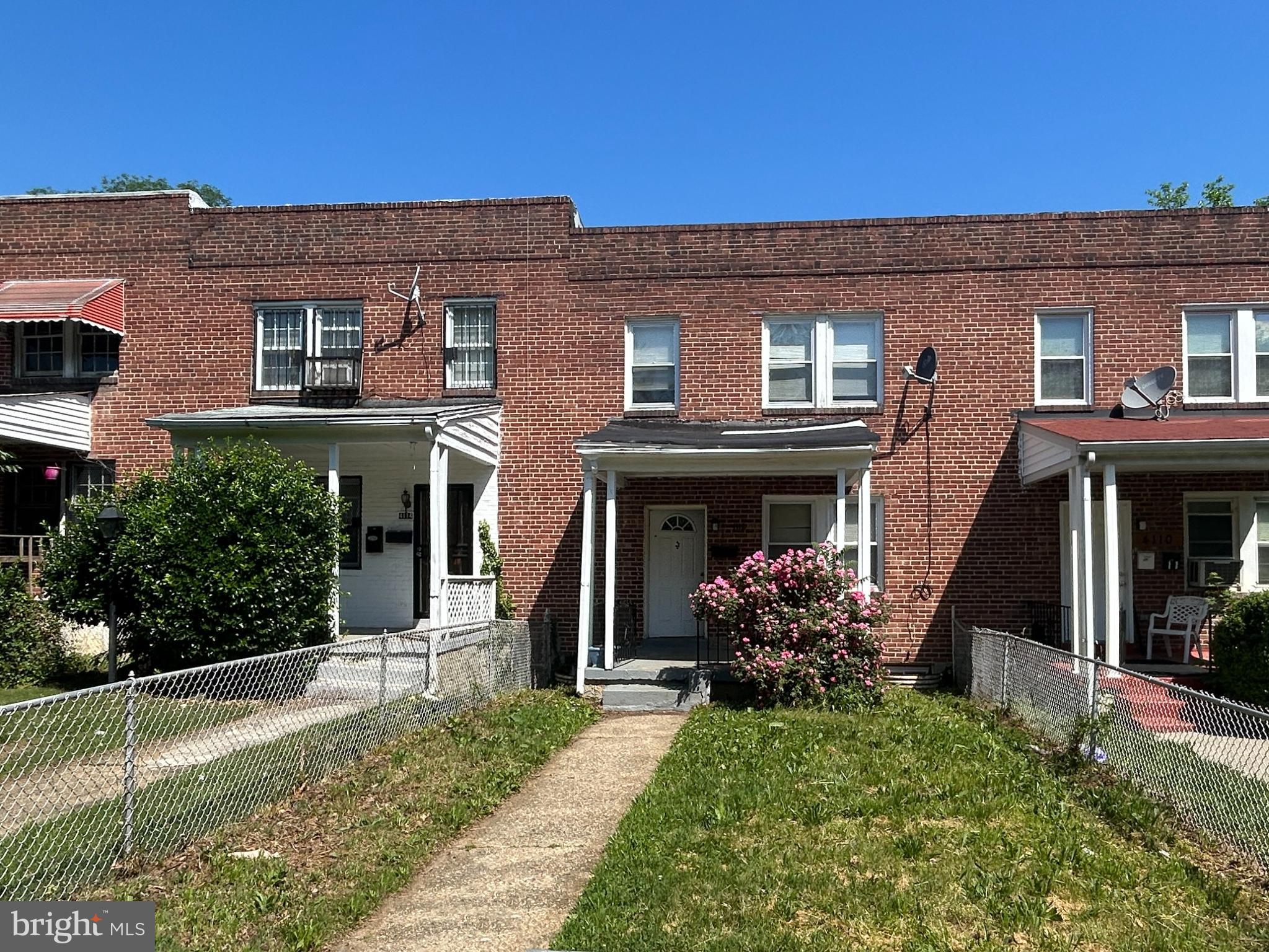 This colonial-style townhouse, built in 1948, is situated in the desirable Windsor Hills subdivision. The property features a classic brick exterior, enhancing its curb appeal and durability. The lot spans approximately 0.05 acres, offering both a front yard and a rear yard, ideal for outdoor activities or gardening. The exterior is complemented by a front porch, which is great for morning coffee or relaxation. On the other hand, the interior features laminate plank flooring, combining aesthetic appeal with practicality. The kitchen with custom-made wood cabinetry, granite countertops and appliances, is a nice place for cooking enthusiasts. Adjacent to the kitchen is the spacious dining room, perfect for entertaining and formal dining. With three bedrooms and a full bathroom with tub shower, this residence is designed to accommodate various lifestyle needs. This home presents an excellent opportunity for those seeking a blend of classic architecture and modern convenience in a vibrant community.