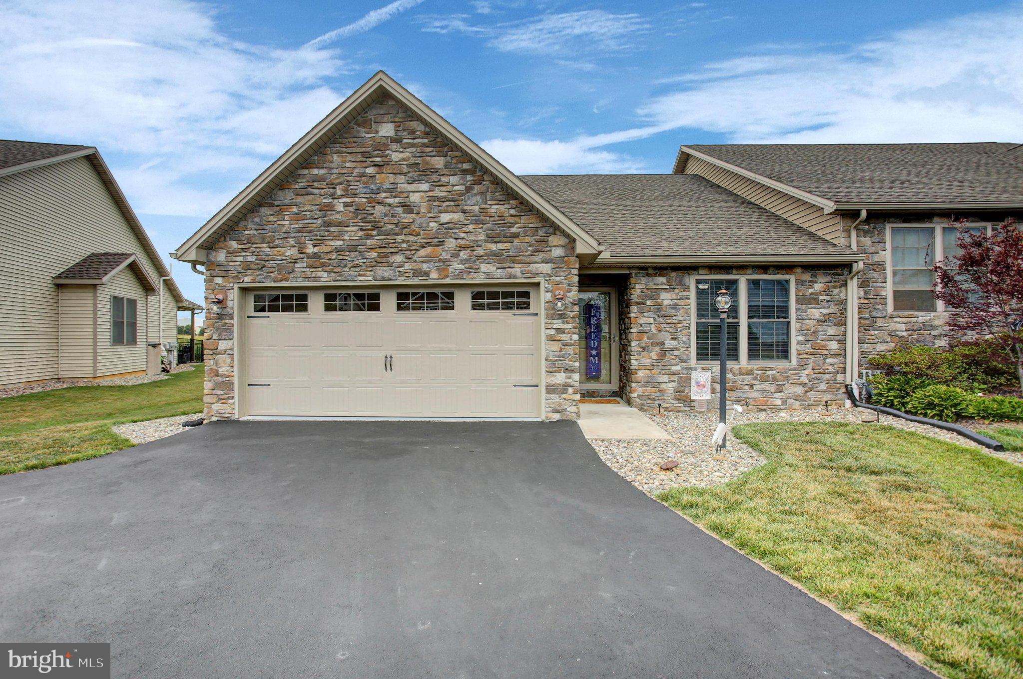 Enjoy easy one-level living in this beautifully maintained end-unit ranch townhome, perfectly located in the Shippensburg Area school district just minutes from shopping, dining, and everyday conveniences with no HOA!

Step inside to find fresh paint throughout and gorgeous hardwood and ceramic tile flooring, with cozy carpet in two of the bedrooms. The spacious great room welcomes you with soaring vaulted ceilings and a stunning floor-to-ceiling stone gas fireplace with a mantel, creating the perfect gathering space. The open floor plan flows seamlessly into the modern kitchen, featuring a large island with an overhang for bar stool seating, a generous pantry closet, and an adjoining dining area that's ideal for everyday meals or entertaining guests.

The primary suite offers a relaxing retreat with a walk-in closet, dual-sink vanity, and a walk-in shower. Two additional bedrooms and a second full bath provide plenty of space for family, guests, or a home office. Main-floor laundry adds even more convenience.

Step outside to the covered porch overlooking the nicely landscaped, private backyard—an inviting place to enjoy your morning coffee or unwind after a long day.

Need more space? The full poured concrete basement features high ceilings and outside access, offering endless possibilities for storage, a workshop, future finished living space, or all three! A two-car garage provides plenty of room for vehicles and additional storage.

As an added bonus, many of the home's furnishings are available for purchase separately, making your move even easier. Sellers prefer closing on or after August 27th.

Don't miss this opportunity to own a move-in-ready home that combines quality, comfort, and low-maintenance living in a convenient location!
