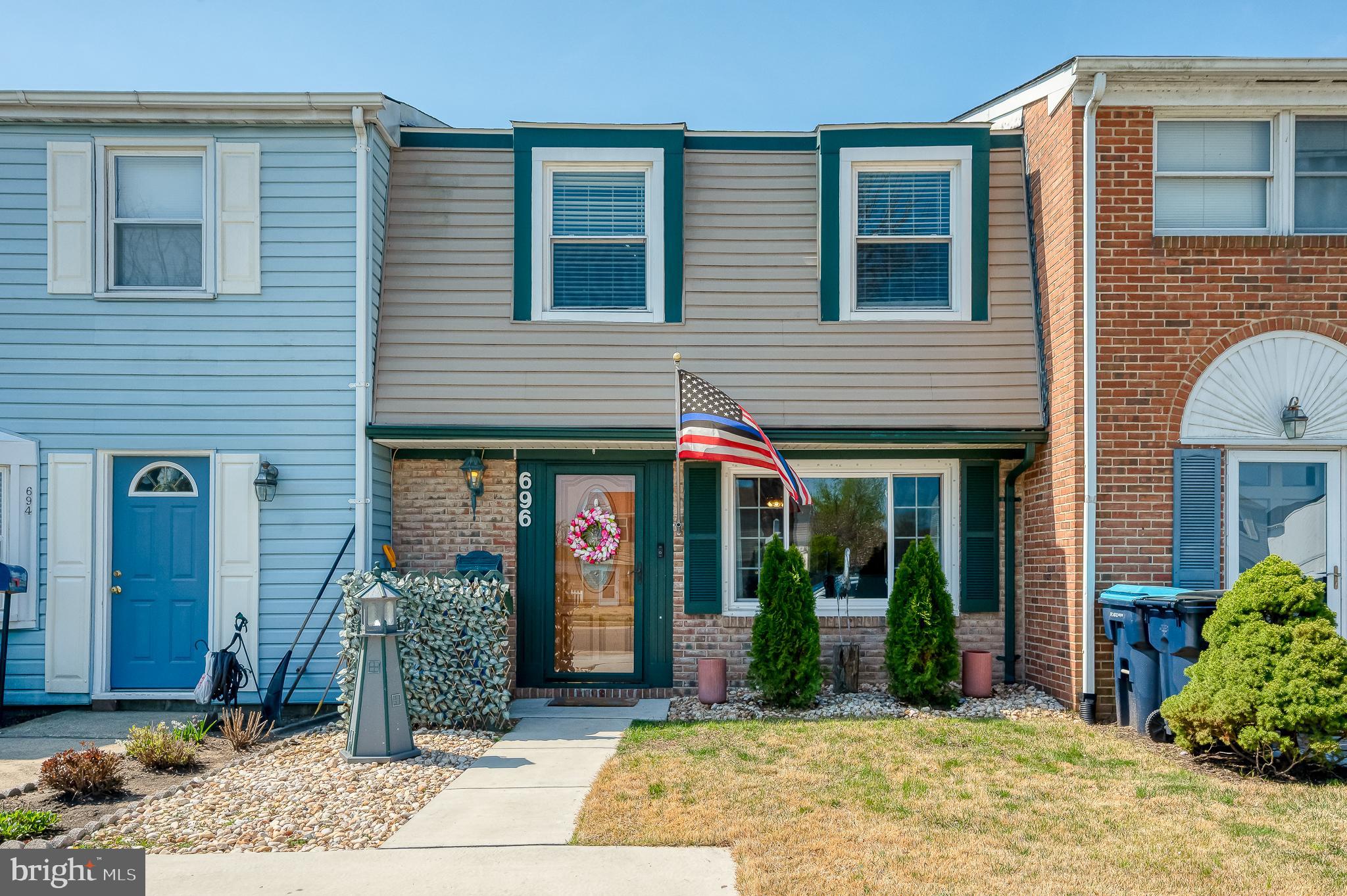 Beautifully renovated townhome in sought-after Rumsey Island featuring a private parking pad and numerous updates throughout. Major improvements include new HVAC (2026), roof (2023), water heater (2019), and windows (2018), offering peace of mind for years to come. The main level showcases luxury vinyl plank flooring (2020) and an updated kitchen with white cabinetry, ceramic tile flooring, stylish backsplash, and a pantry for added storage. A spacious bump-out with vaulted ceiling and recessed lighting provides additional living space with natural light. Upstairs, the primary bedroom offers two closets and direct access to the fully renovated dual-entry bathroom - complete with dual vanities and a glass-enclosed shower with dual shower heads. Additional features include pull-down attic access for extra storage, washer and dryer (2020), refrigerator (2024), and dishwasher (2025). Enjoy outdoor living with a walkout to a stamped concrete patio, fully fenced yard, and a tranquil koi pond (currently no koi).