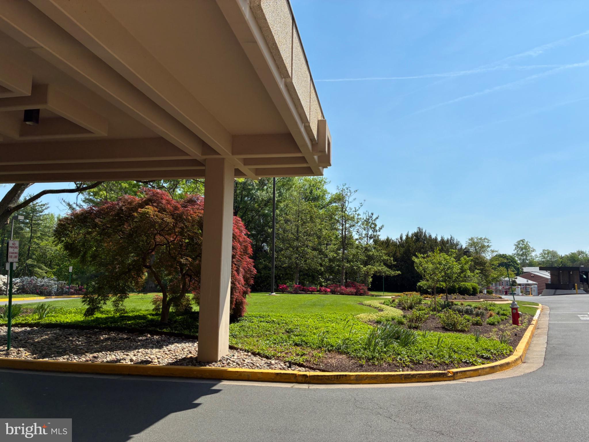 Nestled within the prestigious Regency at McLean, this exquisite 2-bedroom, 2-bathroom residence offers a harmonious blend of luxury and comfort, perfect for those seeking an elevated lifestyle. Spanning 1,476 square feet, this meticulously maintained unit showcases a thoughtful floor plan that seamlessly integrates modern elegance with timeless charm. As you step inside, you are greeted by an inviting entryway adorned with crown moldings and rich wood floors that flow throughout the living spaces. The combination dining and living area is bathed in natural light, creating a warm ambiance ideal for both entertaining and relaxation. The  kitchen features stainless steel appliances, including a built-in microwave and electric range, complemented by sleek countertops and a convenient pantry. Retreat to the spacious primary suite, complete with a walk-in closet and an en-suite bathroom featuring both a stall shower and a tub shower, providing a serene escape at the end of the day. The second bedroom is equally inviting, offering ample space and comfort for guests or a home office. Step outside onto your large private wrap around balcony, where you can enjoy tranquil views of the meticulously landscaped gardens and lawns, creating a peaceful oasis right at your doorstep. The extensive hardscape and outdoor lighting enhance the beauty of the exterior, all on same level as the condo while the community amenities, including a sparkling outdoor pool, picnic area, and concierge services, elevate your living experience. This high-rise gem also boasts a range of conveniences, including in-unit laundry, 24-hour security, and 2 reserved parking in the garage, ensuring peace of mind and ease of living. The community is gated, providing an added layer of security and exclusivity. With its prime location, residents can enjoy easy access major highways and to a variety of amenities, including a beauty salon, library, and convenience store, all within the community. The Regency at McLean is not just a place to live; it's a lifestyle that offers comfort, luxury, and a sense of belonging. Experience the perfect blend of sophistication and warmth in this exceptional residence, where every detail has been thoughtfully curated to create a true sense of home. This is one of the best condos with largest wraparound balconies . Don’t miss out on this great opportunity to own a unique property.