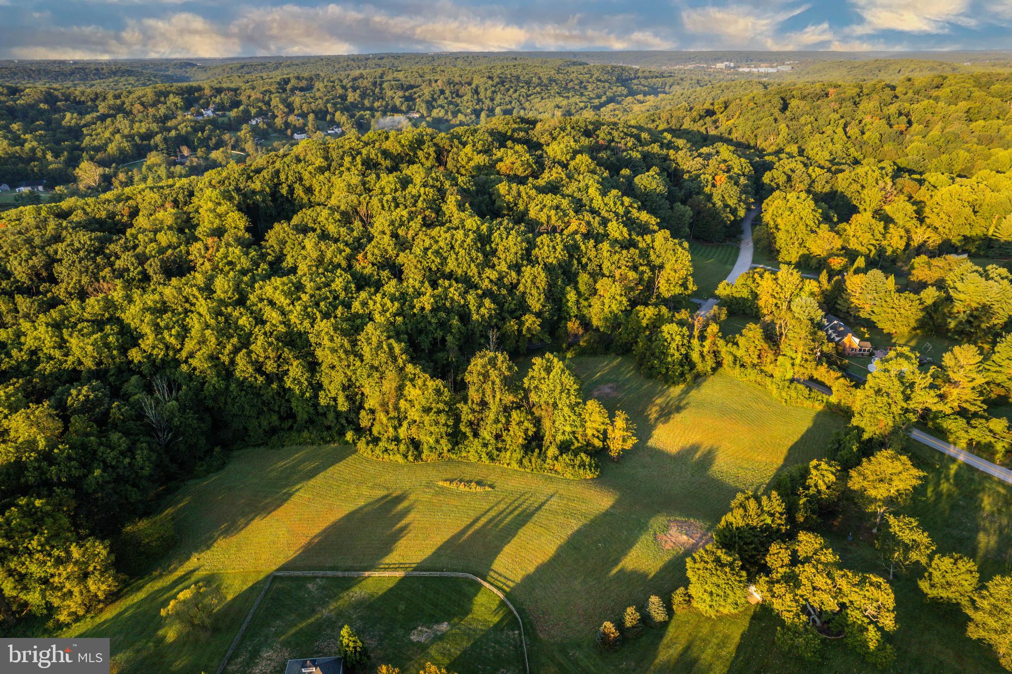 Live authetically. Rarely available majestic 4.84 acre building lot. No builder tie-in. Well is in place. Perc to be revalidated. Glorious, sweeping ground ripe with potential. Realize your vision and create the home you desire now. Get dirt and get going. Privacy abounds. Excellent siting opportunity to capture both sunrise and sunset. A curated floorplan with framed views and sumptuous outdoor living has the ability to change your life. Daily rhythms and your surroundings have great impact. Cultivate your existence. The art of uniting human and home.