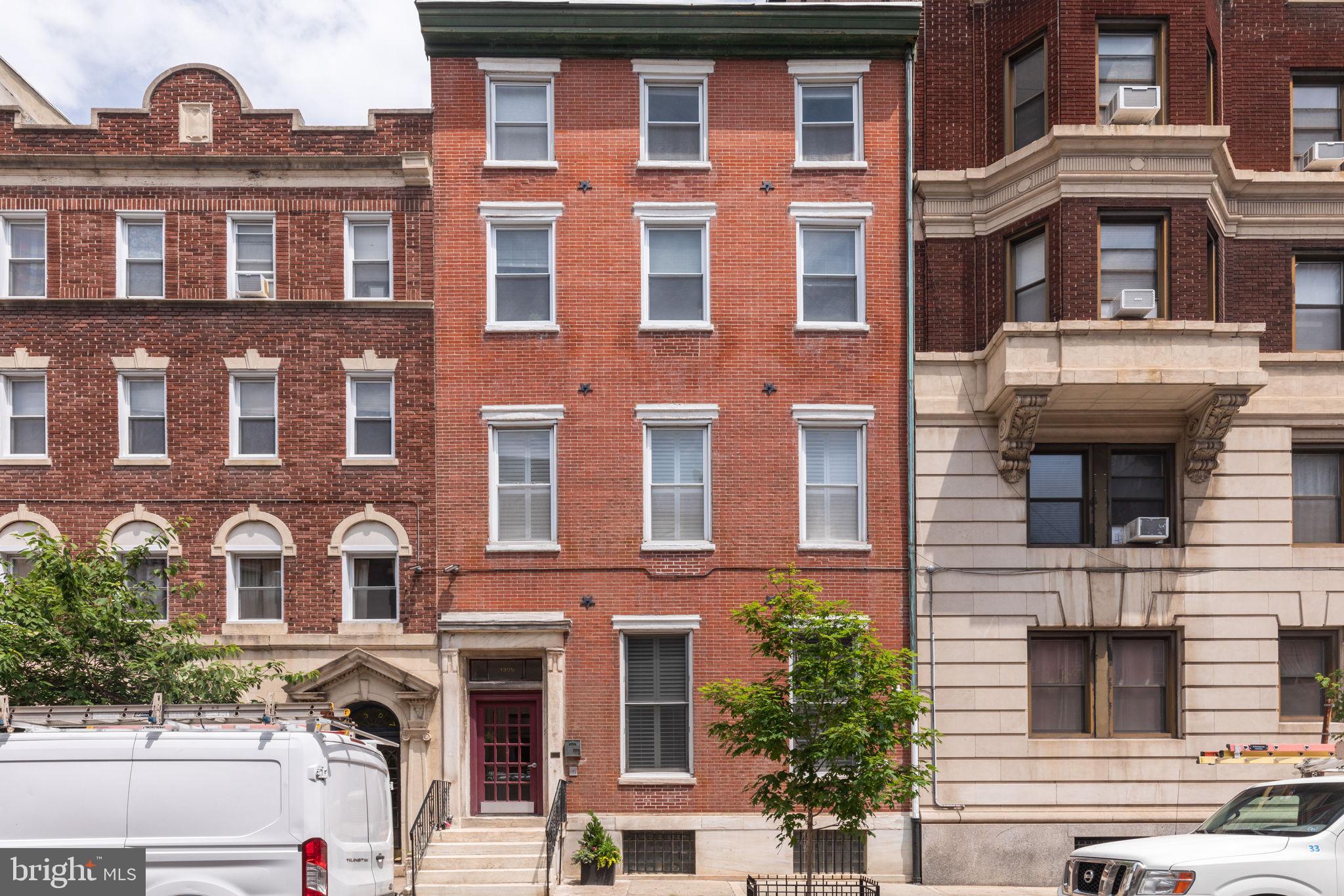 Welcome to 1305 Spruce Street #TH1C, a beautifully appointed 3-bedroom, 3-bathroom residence in the heart of Washington Square West. This spacious home blends character and comfort with hardwood flooring throughout, exposed brick walls, soaring ceilings, and abundant natural light.

The main level features two generously sized bedrooms and two full bathrooms, offering convenience and flexibility. The lower level provides a private third bedroom with its own ensuite bath—perfect for added privacy. This level also includes the well-equipped kitchen, complete with stainless steel appliances, ample cabinetry, and a dedicated laundry area.

The thoughtful 3 bed, 3 bath layout is especially ideal for roommates, whether you're an investor seeking strong rental potential or an owner-occupant looking to offset your mortgage with shared living. Each bedroom having access to its own bathroom creates a functional and appealing setup for multiple occupants.

Residents enjoy premium building amenities including 24/7 lobby access, on-site emergency maintenance, and a 24-hour parking lot conveniently located directly across the street.

Situated just steps from the best of Center City, you’ll be surrounded by top-tier dining, shopping, parks, and cultural attractions. Plus, with close proximity to public transportation, commuting is a breeze with easy access to Philadelphia Sports Stadiums, Temple University, Drexel University, and the University of Pennsylvania.

Don’t miss your opportunity to own a versatile and stylish home in one of Philadelphia’s most sought-after neighborhoods—schedule your showing today!