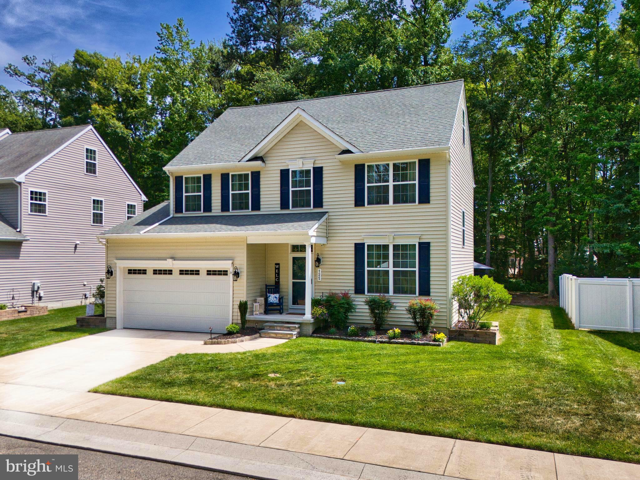 Five bedrooms, move-in ready condition, a hot tub, and an incredible Eastern Shore location—all for under $600,000!! Open House this Saturday, June 13th 11-1PM! Experience the best of Maryland’s Eastern Shore lifestyle in this beautifully maintained 5-bedroom home, perfectly situated in a quiet cul-de-sac just minutes from the water. Whether you’re launching the boat for a day on the Chesapeake, exploring nearby trails, grabbing coffee at the beloved Dessert First Dockside Coffee, or enjoying fresh local seafood at one of the area’s waterfront restaurants, you’ll love having it all right at your fingertips. Inside, you’ll immediately appreciate how exceptionally well cared for this home is, it feels almost new!!!  Fresh updates include brand-new carpet and newly painted living spaces, creating a clean, bright, move-in ready feel throughout. The spacious kitchen features updated countertops, propane cooking, and an island that opens to the heart of the home. Gather around the cozy pellet stove in the family room or retreat to the versatile third-floor bonus space, perfect as a 5th bedroom, home office, playroom, guest suite, or whatever fits your lifestyle. Step outside to your own private retreat, complete with a spacious patio and hot tub ideal for relaxing or entertaining. Private driveway with additional  overflow and guest parking available!!! With generous living space, thoughtful updates, and an unbeatable location just minutes from marinas, boat ramps, waterfront dining, and the Bay Bridge, this home delivers everything buyers love about Eastern Shore living, without sacrificing convenience. You won't want miss this one!