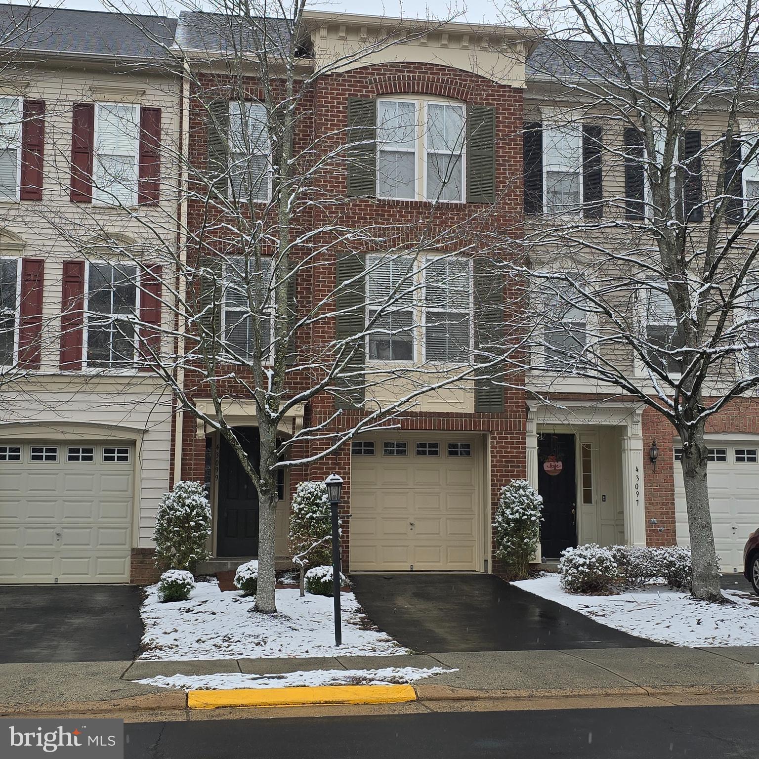 Seller accepted a sight unseen offer.   Welcome Home to 43099 Hunters Green Square!
Experience modern comfort in the heart of Broadlands, one of Ashburn’s most sought-after master-planned communities. This meticulously maintained townhome offers an exceptional lifestyle with resort-style amenities—including three community pools, tennis and basketball courts, over 20 miles of trails, and a nature center—all just steps from your front door. 

Main Level & Versatile Living:

Step inside from your private garage into a welcoming tiled foyer. The entry level features a versatile flex space perfect for a home office or recreation room, along with a convenient powder room, laundry area, and access to the rear exit.

The Heart of the Home:

The second floor opens into a sunny kitchen featuring warm wood floors, a center island,  upgraded cabinetry with glass-door accents and a built-in wine rack. This central hub is flanked by two distinct living areas: a sun-drenched family room with a cozy gas fireplace, brand-new carpet, and direct deck access, and a formal dining area framed by elegant floor-to-ceiling windows. A second powder room is discreetly tucked away on the landing for guests.

Private Retreats:

The upper level serves as a quiet sanctuary. The spacious primary suite features a newly remodeled en-suite bath and a custom-designed walk-in closet. Two additional bright bedrooms and a full hall bath are located at the opposite end of the hall, providing a perfect layout for family or guests.

Exceptional Upgrades & Peace of Mind:

The owners have invested significantly in high-ticket maintenance so you can move in with total confidence. Recent improvements include:
2026: Main bath ensuite remodel, fresh interior paint, new carpeting, new hot water heater, and front exterior paint/repairs.
2023: Full deck replacement and a new dishwasher.
2022: New front gutters.
2020: Full roof replacement.
Additional: New refrigerator and a replaced HVAC system (2010). 

Unbeatable Location:

Convenience is at your doorstep with easy access to Broadlands Marketplace (anchored by Harris Teeter) and Broadlands Village Center, home to Aldi, Lidl, and popular local dining like Parallel Wine & Whiskey Bar and Clyde’s Willow Creek Farm. Commuters will appreciate being just 2.1 miles from the Ashburn Metro Station and only 10 minutes from Dulles International Airport. 

Don't miss your chance to call this pristine Broadlands property "Home."