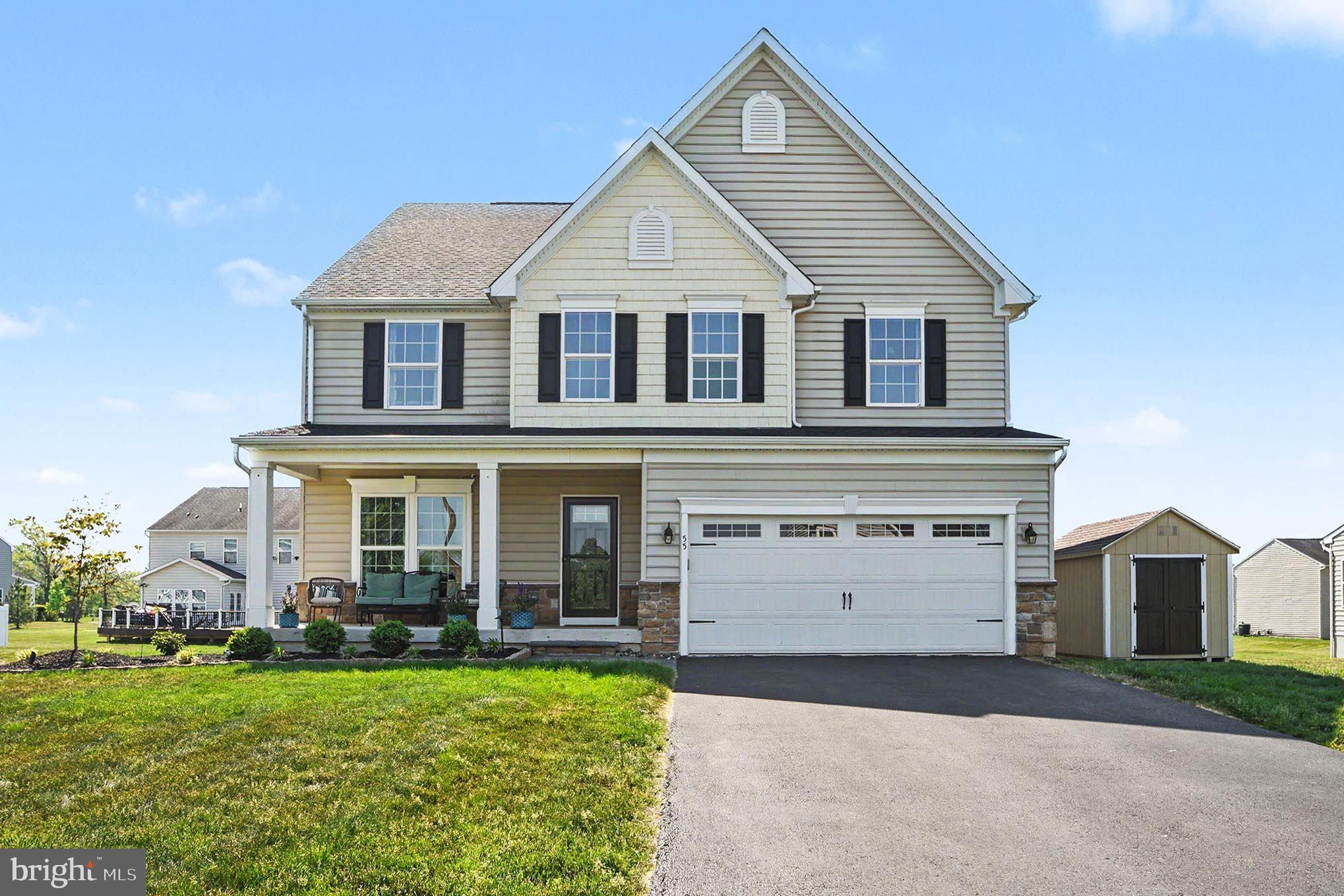 Welcome Home to the Preserves at Montgomery in the highly desirable town of Gilbertsville, situated within the Boyertown School District. Arriving at 55 Huntsville Drive, your journey begins at the covered front porch, perfectly positioned to face stunning sunsets that tuck behind the rolling hillside. Stepping inside this beautifully designed Rome Model, you will immediately notice a space fit for the cover of a magazine, boasting a highly sought-after open concept and a flexible floor plan that is ideal for entertaining while maintaining a comfortable, welcoming feel.
The walk-through begins in the foyer, where gleaming hardwood floors flow seamlessly underfoot and guide you deeper into the main level. To the side, the formal living room and dining room elevate the home's level of elegance. The hardwood floors continue into the back of the home, leading you into a chef’s paradise of a kitchen. This space features an upgraded extended gourmet island, upgraded countertops, stainless steel appliances, recessed lighting, painted hazelnut glazed cabinets, and a large walk-in pantry. The kitchen opens directly to a bright morning room, as well as a practical mudroom and half bath nearby. Adjacent to the kitchen is the spacious family room, ready for cozy movie nights. Tucked off the family room is another highly flexible space, perfectly suited for use as a private office, playroom, sitting area, or exercise room.
Heading upstairs, upgraded elegant lighting leads the way to the second level. Here you will find a Pinterest-worthy master suite of dream proportions, measuring an impressive 23.3 x 15.7 and featuring its own 10.10 x 6.5 sitting area. This private sanctuary includes two walk-in closets and a master bathroom equipped with dual sinks, a linen closet, and a walk-in shower. Continuing down the hallway, you will discover another hidden gem: a beautiful open loft currently used as a sitting area, which could easily be converted into another bedroom if ever needed. The three remaining bedrooms on this level are very spacious and come complete with large closets.
The tour continues on the lower level, where a finished basement offers an additional 674 square feet of versatile space. Whether you envision a pool table, an exercise area, a playroom, a dedicated gaming retreat, or an entertainment hub, this level can accommodate anything your heart desires. The basement also includes two additional storage areas and a rough-in convert the half bath to a full bath if desired. For ultimate peace of mind, this home was built with the Ryan Homes Built Smart energy efficiency program, completing a perfect blend of style, function, and modern comfort.