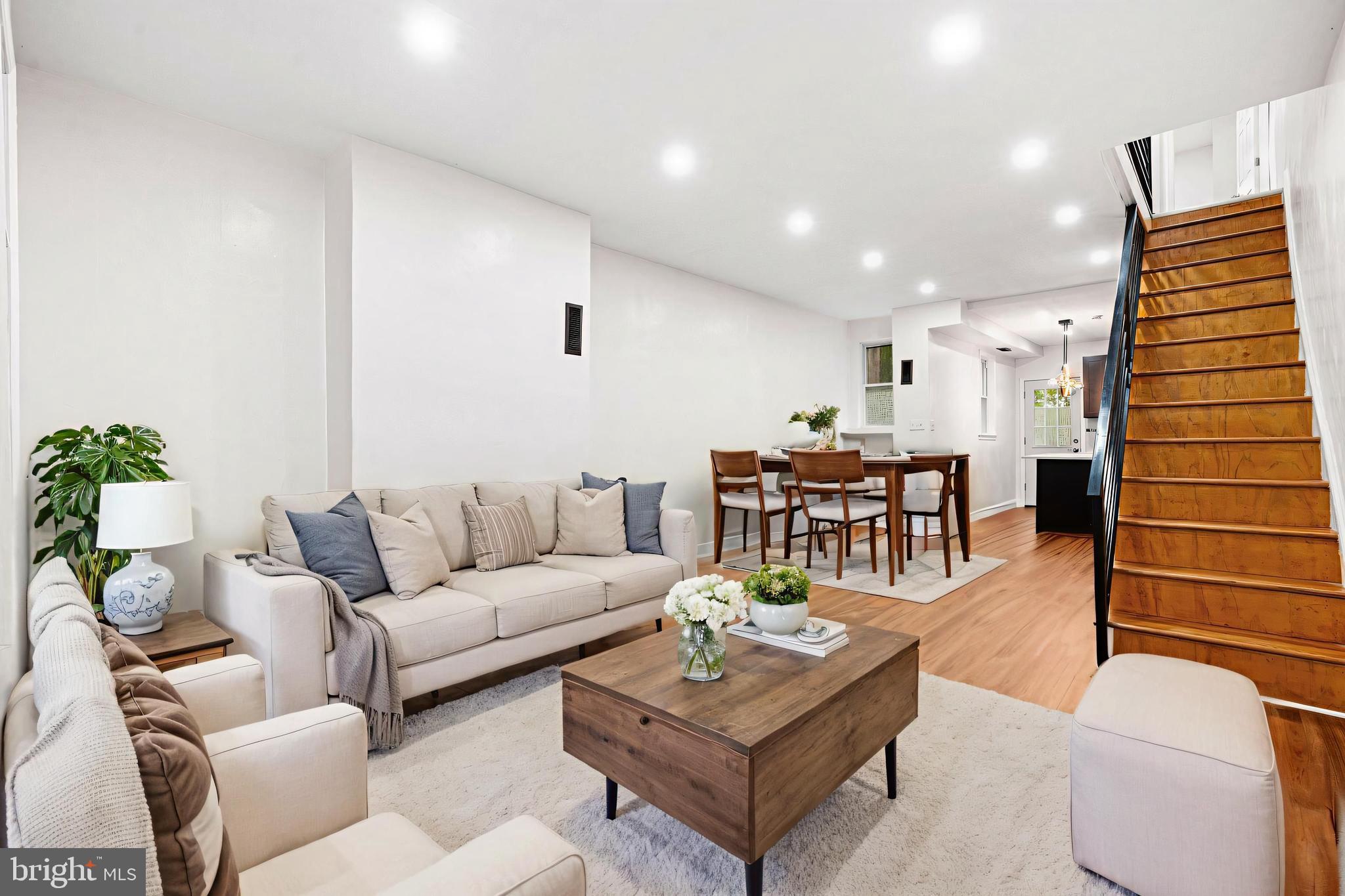***Qualified first-time buyers may be eligible for up to $5,000 in local grant assistance with local bank.*** Welcome to 4750 Paschall Avenue, a beautifully renovated 3-bedroom, 1.5-bath rowhome offering the perfect mix of modern comfort, style, and convenience in Southwest Philadelphia. Completely updated from top to bottom, this move-in-ready home blends classic Philadelphia townhouse charm with contemporary finishes. Step inside to an open-concept main floor filled with natural light, warm wood-tone flooring, and recessed lighting that highlight a spacious living and dining area flowing seamlessly into a modern chef’s kitchen featuring rich espresso cabinetry, stainless steel appliances, marble-look backsplash, and white quartz-style countertops—a perfect setting for cooking, entertaining, and gathering with friends and family. Upstairs, you’ll find three generous bedrooms and a beautifully updated full bathroom with marble-look tile, colorful mosaic accents, and sleek fixtures for a spa-inspired feel. The finished basement adds flexible living space ideal for a recreation room, home gym, or office, complete with a convenient half bath and extra storage. Outside, enjoy a private rear patio perfect for morning coffee, grilling, or relaxing outdoors. This prime location offers easy access to Center City, University City, CHOP, Drexel, and UPenn, with nearby access to I-76, I-95, public transportation, grocery stores, parks, and the Grays Ferry Shopping Center and Pennovation Works. Eligible first-time buyers may also qualify for Philly First Home or local bank grant programs, making this beautifully updated property an incredible opportunity to own a stylish, affordable home in one of Philadelphia’s fastest-growing areas.