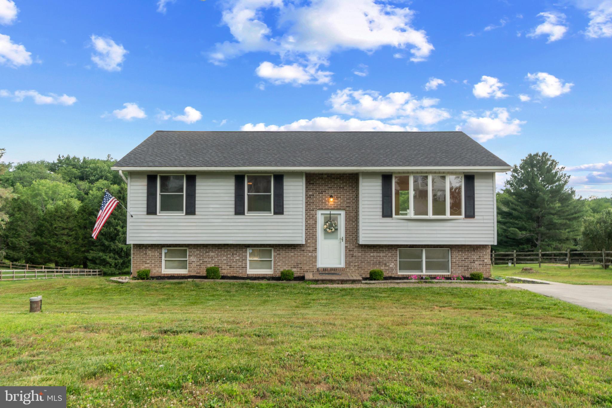 Welcome to 2217 Ridgemont Drive in desirable Finksburg, Maryland! This beautifully updated, move-in ready split foyer home offers the perfect combination of modern updates, functional living space, scenic pond views, and NO HOA.

Nestled in a sought-after Carroll County neighborhood, this well-maintained home backs to a picturesque pond and peaceful green space, creating a private backyard retreat where you'll enjoy watching deer, geese, and other local wildlife year-round. Whether you're entertaining guests or simply unwinding after a long day, the spacious rear deck provides the perfect setting to take in the water views and natural surroundings.

Inside, you'll find 3 spacious bedrooms and 3 full bathrooms, including a primary suite with an attached private bath. The main level has been extensively refreshed in Spring 2026 with luxury vinyl plank flooring throughout, fresh neutral paint, and updates to all three bathrooms. The lower level features brand-new carpeting and offers a large unfinished space with endless possibilities. Easily convert this area into a 4th bedroom, home office, fitness room, playroom, or additional living space to create instant equity and increase future value.

The updated kitchen is ideal for both everyday living and entertaining, featuring newly painted cabinetry, granite countertops, a bar-height peninsula, a brand-new microwave, and newer stainless steel appliances. The open layout allows for easy flow between the kitchen, dining area, and outdoor living space.

Major updates provide peace of mind, including a brand-new 30-year architectural shingle roof installed in Fall 2025, new hot water heater (July 2025), newer washer and dryer, refreshed bathrooms, new flooring, new carpet, and fresh paint throughout the entire home.

Conveniently located near shopping, restaurants, parks, and downtown Westminster, this home offers the perfect balance of peaceful suburban living and commuter convenience with easy access to major routes including Route 140, I-795, Baltimore, Westminster, and surrounding employment centers. Located within the highly rated Carroll County Public School system, this property is ideal for buyers seeking updated finishes, outdoor living, water views, future expansion potential, and a prime location.

Rarely do homes offering pond views, modern updates, no HOA restrictions, and room to grow become available in Finksburg. Schedule your private tour today and discover everything this exceptional property has to offer.