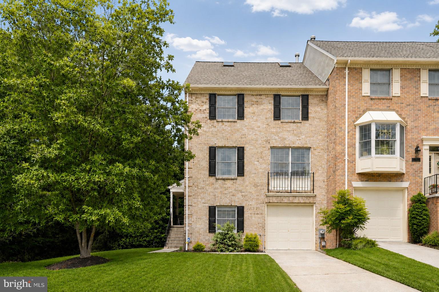 Welcome to the opportunity to own an end-of-group, three-bedroom brick townhome with a garage in the highly sought-after Mays Chapel community. Lovingly maintained and move-in ready, this home offers a wonderful foundation to enjoy today while providing the perfect opportunity to personalize and refresh at your own pace.
The spacious, sun-filled living room flows seamlessly into the formal dining room, offering the ideal balance of open-concept living while maintaining a distinct space for both everyday meals and special occasions. The eat-in kitchen features a gas range, double sink, pantry, recessed lighting, and a charming breakfast nook. Step through the French doors onto the expansive deck with built-in perimeter bench seating and an awning, where mature trees create a peaceful backdrop for outdoor dining or quiet relaxation.
Upstairs, a skylit landing welcomes you to the tranquil primary suite, highlighted by a vaulted ceiling, two walk-in closets, and an en suite bath with a jetted soaking tub, double vanity, skylight, cathedral ceiling, and stall shower. Two additional generously sized bedrooms, each with vaulted ceilings, and a full hall bath complete the upper level.
The finished lower level expands the living space with a spacious recreation room featuring walkout access to the shaded patio, a convenient powder room, and a versatile bonus room that is ideal for a home office, fitness area, or hobby room.
Enjoy the remainder of summer in this exceptional home while taking advantage of its prime location just minutes from shopping, dining, and commuter routes including I-83 and I-695.