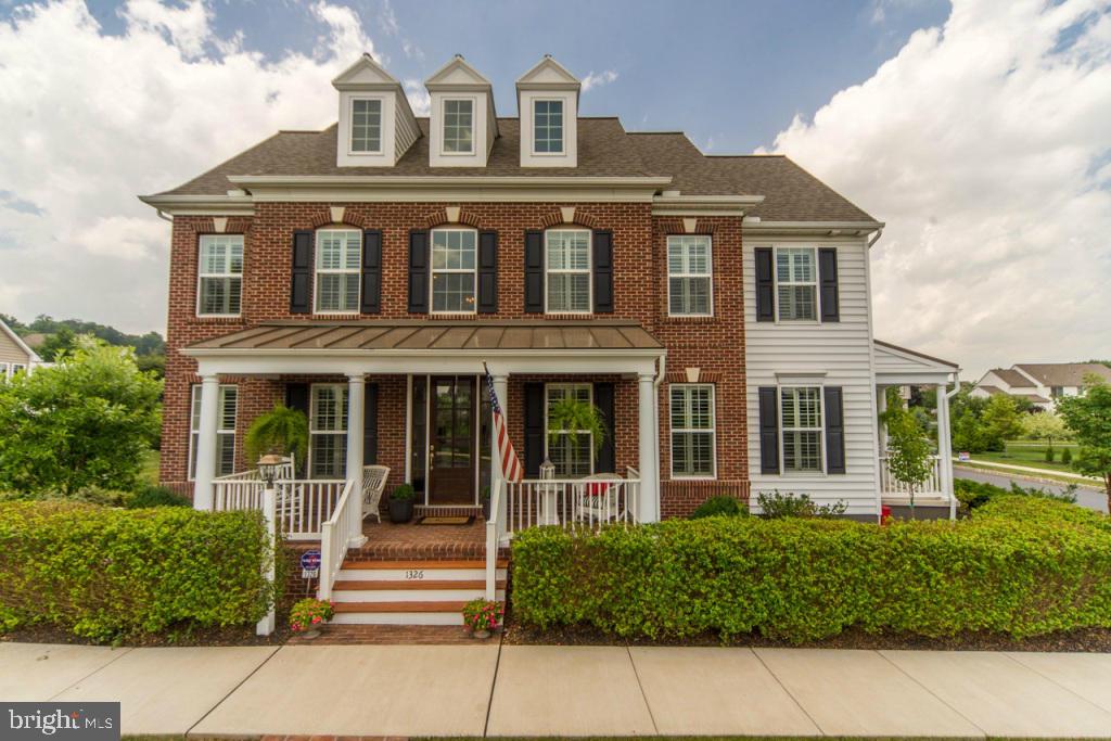 Spectacular home throughout w/ fabulous floor plan.  Home was originally featured in the 2010 Parade of Homes.  Exquisite kitchen design, cabinetry, granite counter tops, backsplash and appliances.  Beautiful hardwood floors and moldings on both levels.  The morning sun enhances the cozy living room and adjoining study.  Beautiful master with hardwood floors and spa bath with marble flooring.