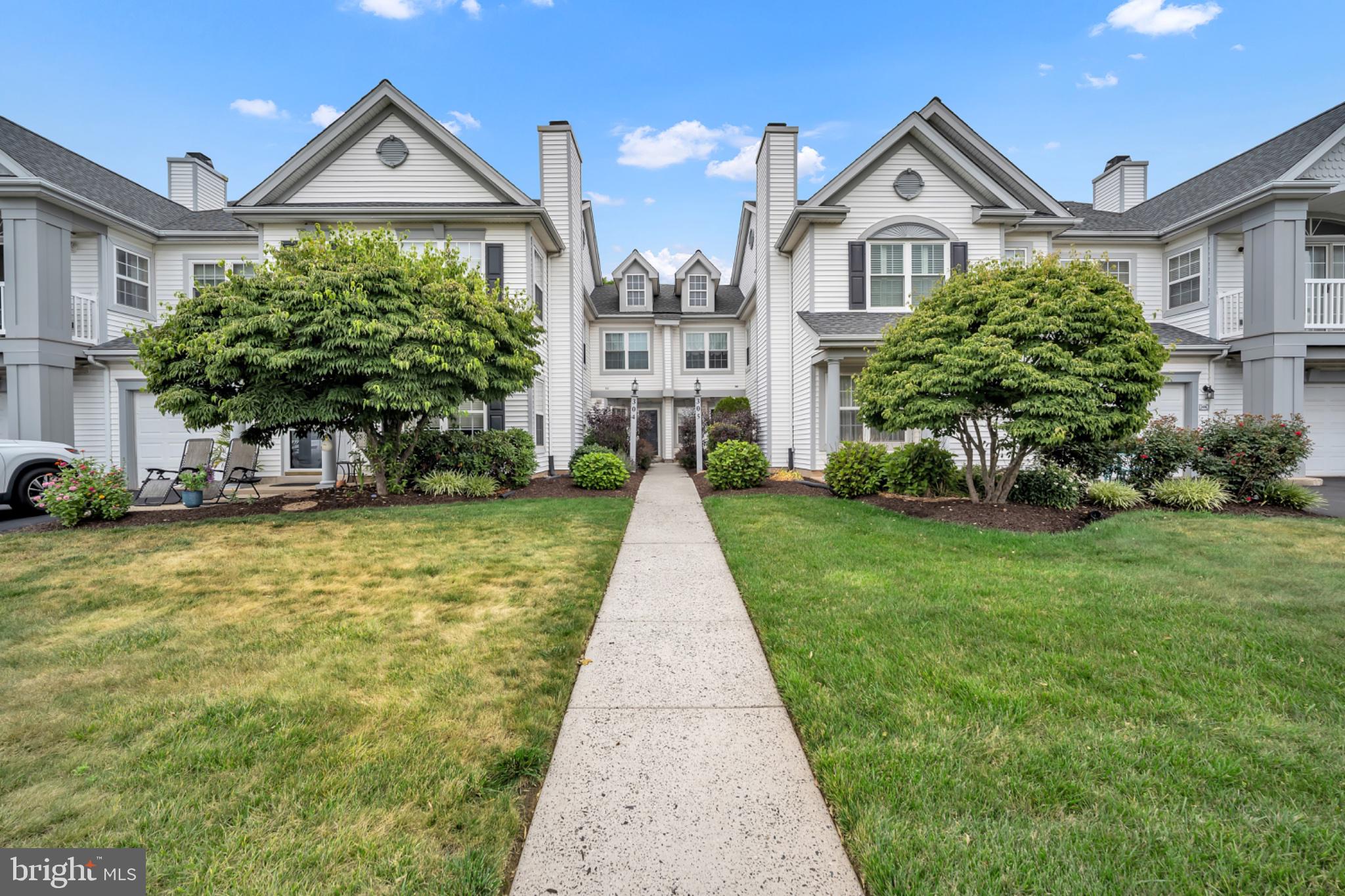 Nestled in the charming Country Crossing community, this beautiful 2 bedroom, 2 bathroom condo offers a perfect blend of comfort and convenience. This well-maintained unit offers an inviting open floor plan that seamlessly connects the kitchen, dining, and living areas, creating an ideal space for both relaxation and entertaining. The heart of the home is the spacious kitchen, complete with a cozy breakfast area, perfect for morning coffee or casual meals. The living room, enhanced by a warm fireplace, invites you to unwind after a long day. This home also offers a ton of natural light. At the end of the hallway enter to the primary suite, featuring a walk in closet and a private bathroom with a walk-in shower. The second bedroom is versatile, perfect for guests or a home office. Right off the hallway is the second bathroom with a shower/tub combination. Enjoy the ease of maintenance-free living with included lawn care, snow removal, and trash services. The attached garage and driveway provide ample parking and additional storage space. Located in a vibrant neighborhood, you'll find local parks, shopping, and dining options just a short drive away. Don't miss your opportunity to experience the warmth of community living in this inviting home!