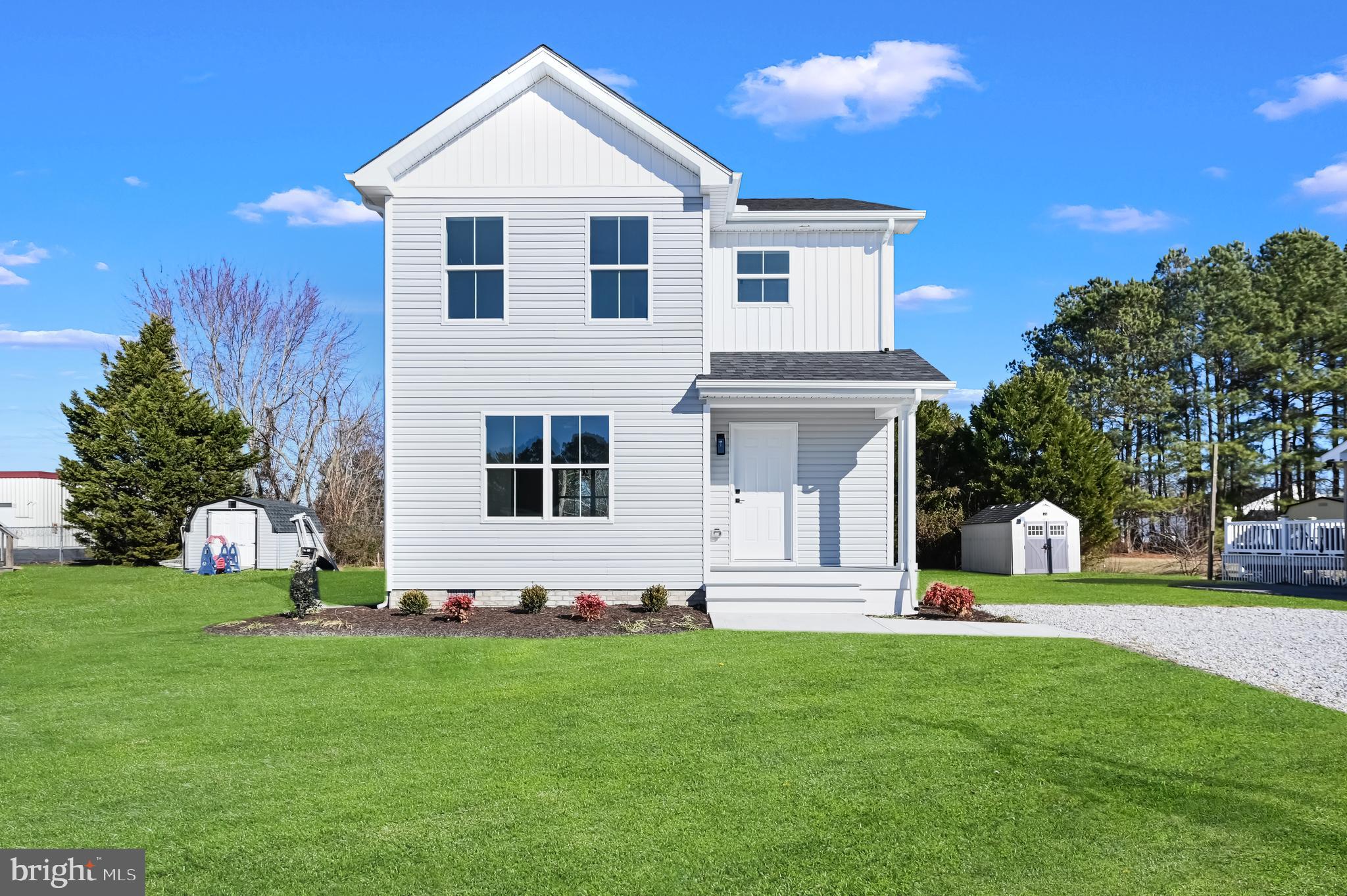 Welcome to this beautiful new construction home in Pocomoke City, MD.  The home has 3-bedroom, 2.5-bath offering modern design, quality construction, and thoughtful upgrades throughout. The open-concept main level features a stylish kitchen with rich wood cabinetry, soft-close drawers, premium quartz countertops, stainless steel appliances, and plenty of space for entertaining. A convenient half bath completes the first floor. Upstairs, the spacious primary suite provides a private retreat with a walk-in closet and en-suite bath. Two additional bedrooms share a well-appointed full bathroom, while the upstairs laundry hook-up adds everyday convenience. Built with premium finishes inside and out, this home showcases CertainTeed siding, IKO Cambridge Lifetime LTD shingles, MI V3000 series windows, upgraded exterior lighting, and professionally installed landscape beds that enhance curb appeal. Interior highlights include durable luxury vinyl plank flooring with a lifetime manufacturer warranty, upgraded Craftsman-style trim and doors accented by Ledo hardware, and custom wood shelving in the closets and pantry. Move-in ready and designed for modern living, this home combines style, comfort, and quality craftsmanship in every detail. Don't miss your opportunity to make it yours—schedule your private tour today!