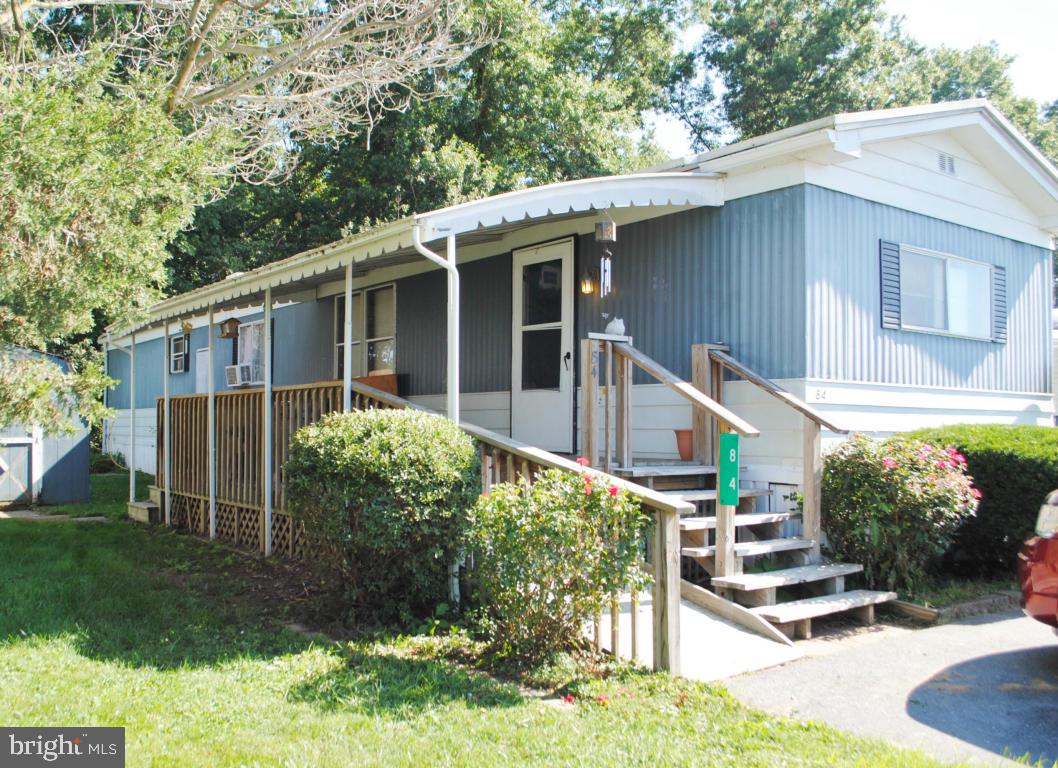 ATTN CASH BUYERS..... PRICED TO SELL QUICK. Surprisingly open and spacious, this 1977 Standard ''Holiday Cottage'' 14x70 has a bump out in the Livingroom/diningroom so it feels like a doublewide. It has ramp access, covered porch, recently converted furnace to propane, and some fresh interior paint. Ceramic tile countertops in kitchen. More pics coming soon! Quick occupancy is possible. Buyer can choose propane company for tank delivery.