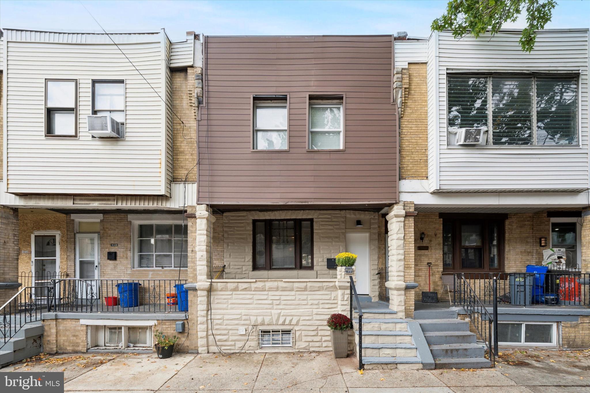 Looking to grow your portfolio with a property that's ready to generate income from day one? Look no further. This renovated and fully furnished townhouse requires no additional investment, making it a strong turnkey rental opportunity in one of South Philadelphia's neighborhoods. Stylish, open, and made for living — this home delivers! The beautifully designed living area boasts modern finishes throughout, anchored by a dream kitchen complete with quartz countertops, a stylish backsplash, and a generous island which is ideal for everyday living and entertaining guests. Upstairs, three spacious bedrooms await, including a primary suite with a private en-suite bathroom, plus an additional full bath for added convenience. The basement offers a flexible bonus space that can easily serve as a home office, gym, or extra storage — a versatile feature that adds value for both homeowners and tenants. The outdoor spaces here are just as impressive as the interior. From the welcoming front porch to the spacious backyard, outdoor living doesn't get better than this. Enjoy quiet mornings and relaxing evenings on the inviting front porch, or host gatherings in the backyard, your own private outdoor escape. Perfectly situated minutes from Downtown Center City, 30th Street Station, multiple public transit options, and I-76, this location puts Philadelphia's top employers, universities, and amenities within easy reach — a major draw for residents and renters alike. Whether you're a homebuyer searching for a move-in ready gem or an investor looking to add a turnkey, income-generating property to your portfolio, this home is truly move-in ready with nothing left to do but enjoy. This is truly a rare find — schedule your tour today and don't let it slip away!