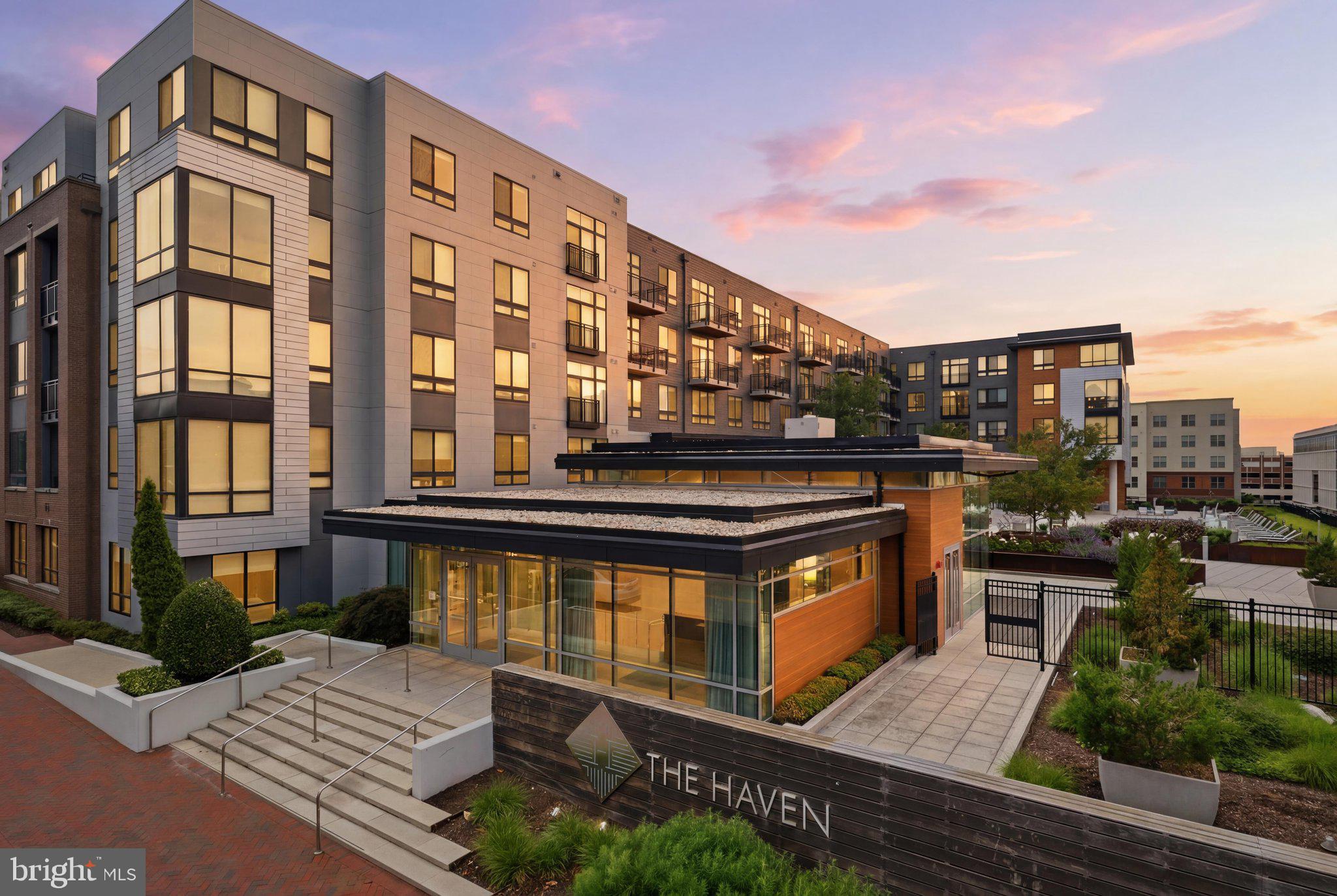 Urban Contemporary Meets Resort-Style Luxury at National Harbor

Welcome to 145 Riverhaven #550, a pristine, top-floor residence where luxury, comfort, and sophisticated design seamlessly converge. From the moment you step inside, the open-concept layout effortlessly connects the kitchen and living spaces, creating an immediate sense of scale and modern elegance.

Inside the Residence
Designer Kitchen: A culinary masterpiece featuring striking two-tone cabinetry that adds exceptional depth. The centerpiece quartz island anchors the space, perfectly complementing the premium countertops and a full suite of stainless-steel appliances (including a built-in microwave).

Private Courtyard Balcony: The bright living room extends outdoors to a private balcony overlooking a serene, beautifully landscaped courtyard—your personal urban oasis.

Spacious Owner’s Suite: A generous bedroom designed to easily accommodate a king-size bed, paired with a massive walk-in closet and a refined bathroom complete with a stylish vanity and a soaking tub/shower combination.

Everyday Conveniences: Enjoy the ultimate ease of an in-unit stackable washer and dryer, alongside one dedicated, covered garage parking space.

World-Class Amenities at The Haven
Live like you are on vacation with 15,000 square feet of exclusive, resort-style amenities right at your fingertips:

Relaxation & Recreation: A sparkling pool with private cabanas and a grilling area, a cozy lounge with a statement fireplace, and a community clubroom equipped with a pool table, entertainment kitchen, and flat-screen TVs.

Modern Essentials: Co-working stations distributed throughout the building for seamless remote work, a dedicated pet spa for your furry companions, and a 7-day a week concierge service to manage your everyday needs and secure package retrieval.

The Ultimate Connected Location
Situated in the heart of National Harbor, you are just steps away from world-class dining, vibrant nightlife, and premier shopping.

Seamless Commuting: Close proximity to I-95/295/495, MGM National Harbor, Tanger Outlets, Joint Base Andrews, Joint Base Anacostia-Bolling, the Pentagon, and downtown Washington, D.C.

Leisure & Lifestyle: Enjoy local bike and walking trails, or catch the Water Taxi for a scenic ride across the river to Historic Old Town Alexandria or The Wharf.

This isn’t just a place to live—it is the lifestyle upgrade you have been searching for. Schedule your private tour today and welcome home!