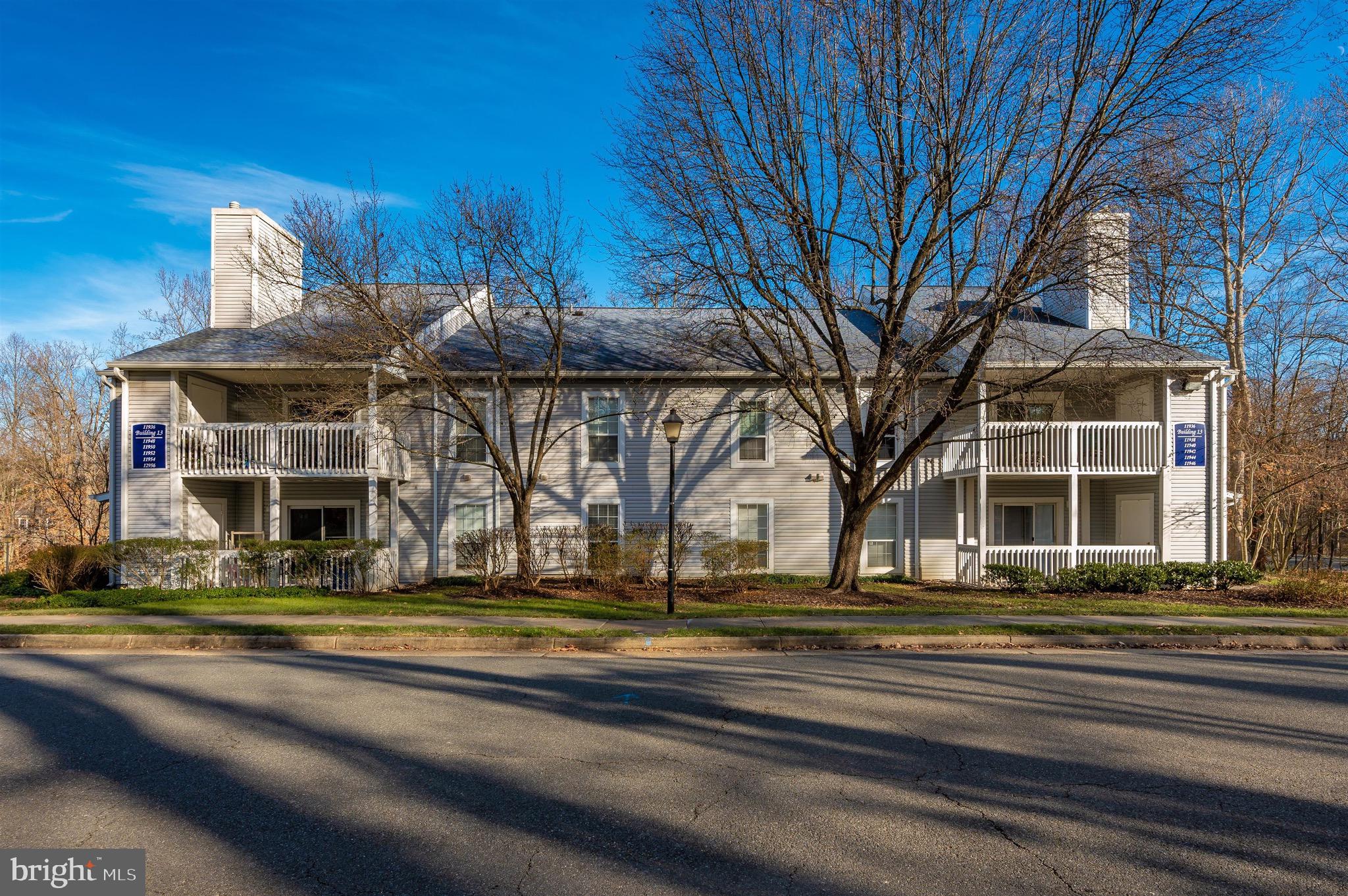 Beautiful and spacious 2 BR /2 BA Condo with a bright sunroom and a deck overlooking a calming wooded setting! The Vinings Condominiums is a prestigious and commuter- friendly community with ample of  amenities for the whole family.  The Condo has a spacious separate dinning-room next to the upgraded kitchen, and Living-room with a Wood-burning Fireplace.  Professional Photos are coming soon!