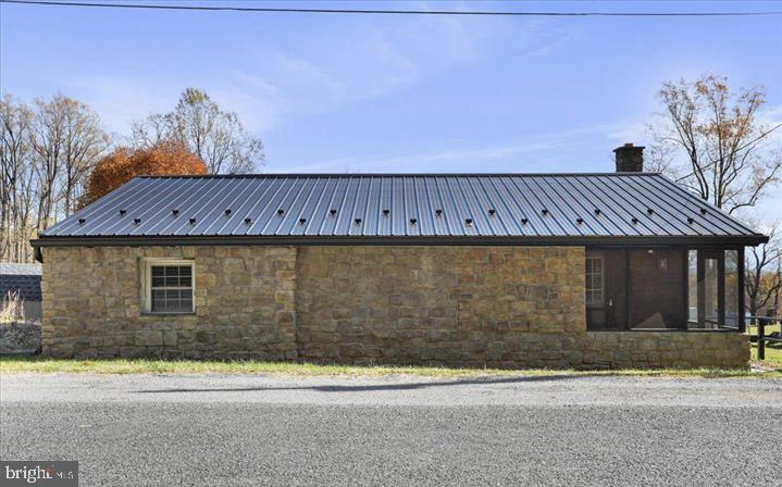 Escape to peaceful country living in this inviting 3-bedroom, 1.5-bath stone home, perfectly nestled against a beautiful mountain backdrop. Set on 1.15 acres, this property offers a rare blend of timeless character, privacy, and scenic views that make every day feel like a getaway.


The home showcases classic stone construction paired with a durable metal roof, offering both charm and long-term peace of mind. Inside, you’ll find a warm, functional layout full of potential—ready for your personal style and vision.


Step outside and take in the expansive yard, ideal for entertaining, gardening, or simply relaxing while enjoying the quiet surroundings and breathtaking views. Whether you’re looking for a full-time residence or a peaceful retreat, this property delivers space, serenity, and opportunity.


Don’t miss your chance to own a slice of countryside charm with unforgettable mountain scenery.