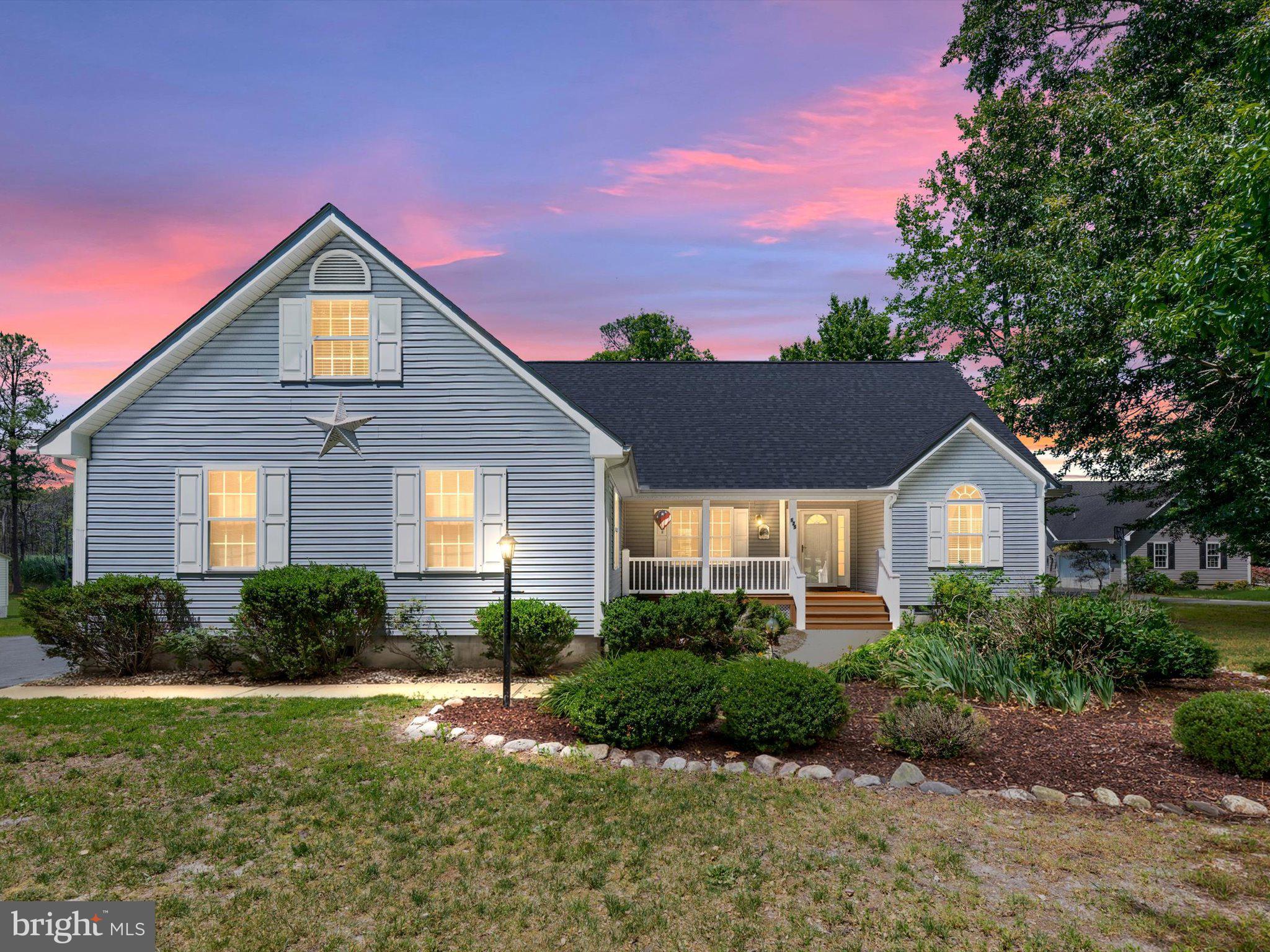 Welcome to 125 S. Newport Way, a custom-built home in the sought-after community of Bethany Forest, where fewer than 100 homes enjoy a peaceful setting just 6 miles to Bethany Beach, restaurants, and attractions of Bethany Beach. Enjoy easy access to some of the area’s finest restaurants, local entertainment, and coastal attractions in nearby Millville and Ocean View.

Offered for the first time since it was built in 2003, this meticulously maintained 3-bedroom, 3-bath residence offers over 3,000 square feet of thoughtfully designed living space with room for everyone. Hardwood flooring flows throughout the main living areas, while the spacious kitchen features quartz countertops, stainless steel appliances, a breakfast nook with a bay window, and views of the tranquil backyard.

The dramatic two-story living room is anchored by a gas fireplace and opens to exceptional indoor and outdoor gathering spaces. The primary suite is a true retreat, featuring a walk-in closet, double vanity, tiled walk-in shower, and French doors leading to a bright 16' x 14' sunroom.

Outdoor living is equally impressive. Enjoy the expansive rear deck overlooking a beautifully nature-lovers backyard that backs to wetlands, creating a private setting filled with birdsong and frequent wildlife visitors. A three-season porch provides the perfect space for crab feasts, family dinners, morning coffee, or simply relaxing with a good book.

Upstairs offers remarkable flexibility with a sprawling 46' x 20' bonus room complete with a wet bar and wine cooler, making it ideal for entertaining, hobbies, a fitness area, media room, or additional guest accommodations. A second upstairs sitting room offers even more possibilities as a game room, office, or private retreat. A full bath serves the upper level.

Additional features include an encapsulated conditioned crawlspace, irrigation system, large storage shed, extended side-entry two-car garage, and ample space to store a boat.

Residents of Bethany Forest enjoy a community pool with pool house, tennis courts, pickleball court, and a low annual HOA fee of just $726.

Recent improvements include a brand-new roof installed in May 2026 with a transferable 50-year warranty.

Bonus: Bethany Forest is currently in the funding phase for Sussex County sewer service, with construction anticipated to begin in 2027 and completion projected for the first quarter of 2028. Existing homeowners are expected to receive the benefit of the current EDU credit/impact fee value of approximately $10,700. Buyers are encouraged to review and approve all available DUCIOA documents uploaded to the MLS as part of their due diligence.

With its exceptional space, privacy, community amenities, and unbeatable location near the beach, this is a home you truly need to experience in person—schedule your tour today and discover all that 125 S. Newport Way has to offer.