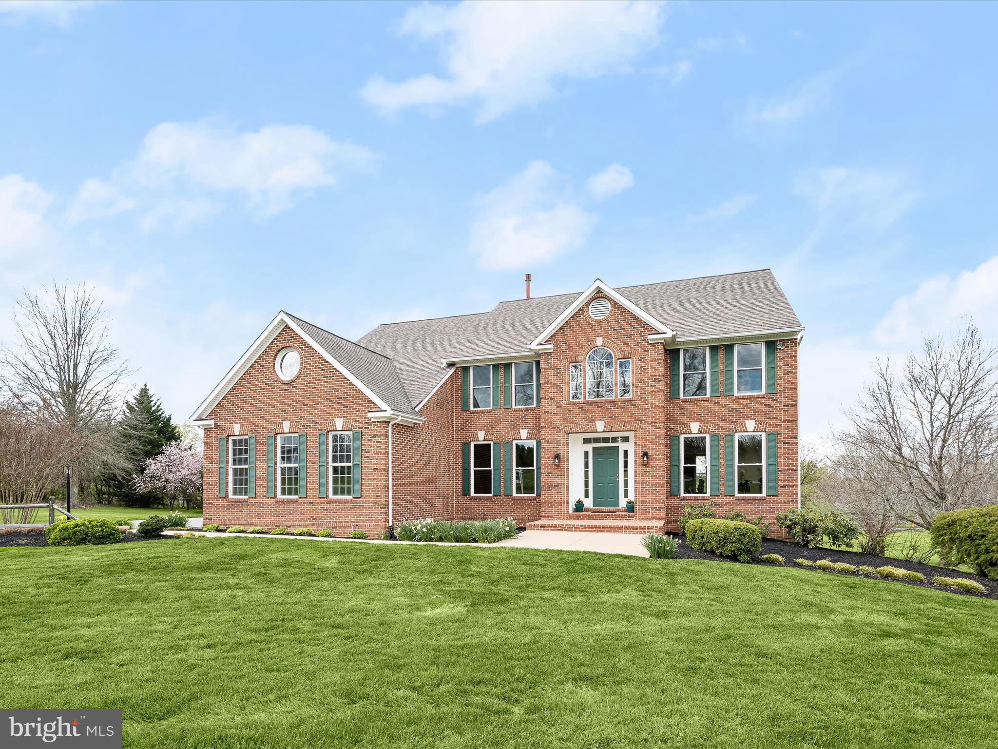Prepare to be captivated by this magnificent four bedroom, three full and one half bath, luxury property,  featuring 4,331 of above grade finished square feet, Set amidst lush landscapes and commanding panoramic views, this property epitomizes  customization and elegance, offering a lifestyle of unparalleled tranquility and comfort.
From the moment you arrive, the grandeur of this all brick front estate, leaves an indelible impression, with an extended private driveway which leads to the residence, perfectly sited, surrounded by pastoral and scenic vistas. A masterpiece of design and craftsmanship, the architectural marvel seamlessly blends classical elegance with contemporary flair, creating a timeless sanctuary of beauty and grace.
Step inside to discover a world of luxury and sophistication. Expansive living spaces adorned with refined finishes, soaring ceilings, and exquisite detailing, evoke a sense of grandeur and prestige, setting the stage for lavish entertaining and intimate gatherings alike.
The recently fully updated ,epicurean kitchen ,is a culinary aficionado's dream, boasting top-of-the-line stainless steel appliances, ( including double wall oven, five burner gas cooktop, commercial range hood, subway shaped porcelain tile backsplashes, huge center island with LED pendant lighting, recessed lighting, butlers pantry, breakfast bar, custom white soft touch close cabinetry, with granite countertops and premium fixtures. Whether whipping up a gourmet meal or hosting a soirée, this culinary haven is sure to inspire the chef within.
A towering grand entrance foyer with crown and dentil moldings, ushers you into the home.  A large formal dining room with chair rails, and crown molding is perfect for large family and friend gatherings. Opposite the dining room, to the right of the foyer, transitions to the formal living room, also adorned with crown and dentil moldings, adding extra entertaining capacity. A convenient home office, framed in by French doors, with new hardwood flooring just installed, offers breathtaking views of the lush green vistas and frequent deer and occasional red fox wildlife. 
A dramatic vaulted ceiling, sunken family room , with a centered brick wood burning fireplace, ( Convertible to gas) is great for warm cozy nights w/the additional benefits of heating your home & heart. A powder room bath, mud room & separate laundry room w/new LVP elongated tile flooring, new utility sink, & new high efficiency dryer, round out the main level.
Ascend the staircase to the palatial master suite, a haven of tranquility & indulgence. With its lavish proportions,  2 colossal size walk in closets, sitting room & new decadent luxury bath, this private oasis offers a respite from the demands of the day, promising restful nights & rejuvenating mornings.  A guest room w/ newly updated en-suite full bath, two additional bedrooms and a just completed full hallway bath, complete the upper level.
Step outside the newly installed sliding doors from the kitchen and family room to discover lush landscaping and manicured grounds creating an ambiance of tranquility & serenity. Lounge on the grand covered and uncovered decks or savor al fresco dining against the backdrop of breathtaking sunsets.
Beneath the elegant facade of this remarkable residence lies an untapped realm of potential, awaiting the creative vision of its fortunate new owners. The vast lower level stands ready to be transformed, eagerly awaiting the touch of inspired creativity. Nestled in exclusive enclave, this prestigious estate offers the ultimate in privacy & seclusion, yet is just moments away from the fine dining, shopping, entertainment, & recreational amenities that Clarksville has to offer. With convenient access to major thoroughfares & airports, the world is at your doorstep. A rare opportunity to own a piece of luxury real estate that transcends the ordinary, zoned to the highly sought after River Hill HS