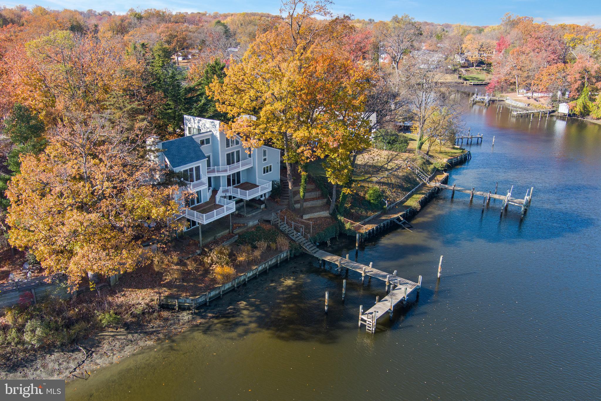 MAJOR PRICE ADJUSTMENT!!!! Eastport Waterfront!!!! LOCATION LOCATION LOCATION.  Extraordinary opportunity to own the best view on Back Creek. This Eastport home has over 3200 sq feet, with deeper water and  4 bedrooms, with separate units allowing for guests and family members who want their own space.  Second floor suite with a fireplace, tall ceilings, large remodeled bath and bedrooms with a loft to boot. The view is spectacular.   First floor has expansive views with 2 bedrooms, the "Main" bedroom has handicap access with a remodeled bath and large walk-in closet.  Downstairs has a living room, bedroom, and large bath.  It can be its own apartment with easy access to the backyard, dock and water.  Small Fenced area for pets, a dock that can handle 2 boats, Private and has water depth 3' plus. Seconds to downtown Annapolis by water, Water Taxi can be minutes away, Close to restaurants, shopping, local fun and entertainment. Handicap access ramp to enter home if necessary. There's a Variance that allows for expansion on the first floor from the kitchen, ARCHITECT information available for those who would like ideas!  Being sold "as is".