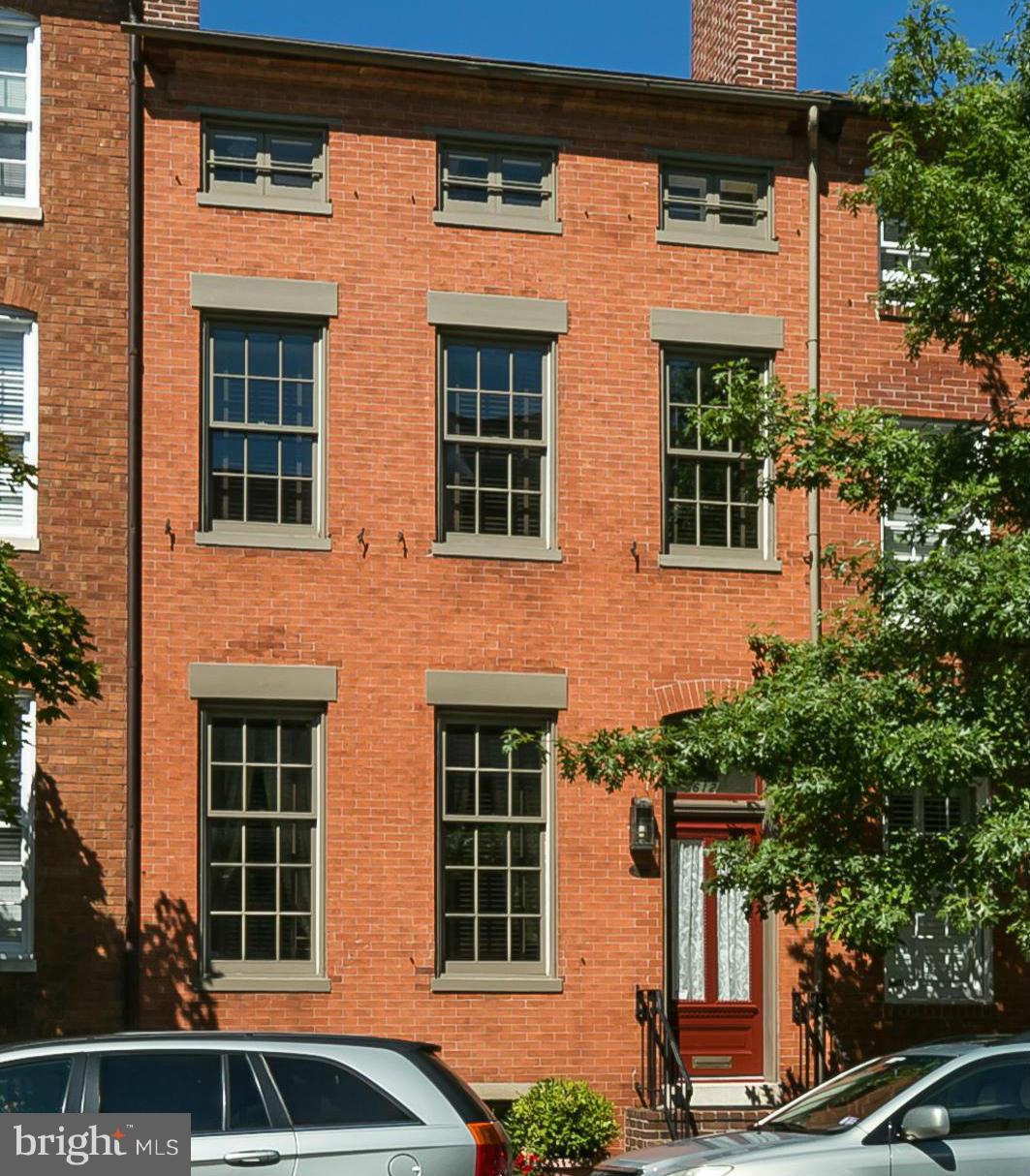 612 S. Hanover exudes the grace & elegance of a classic City town home w more than 2700 sq ft of living space. Step inside a gracious foyer & feel the charm of large doors, crown moldings & original heart pine floors. Beautiful staircase, 6 fireplaces & original mantles. 4BR's, 3.5BA's. Rear mudroom leads to fantastic bricked patio & one of the neighborhood's most beautiful parks. Well Maintained!