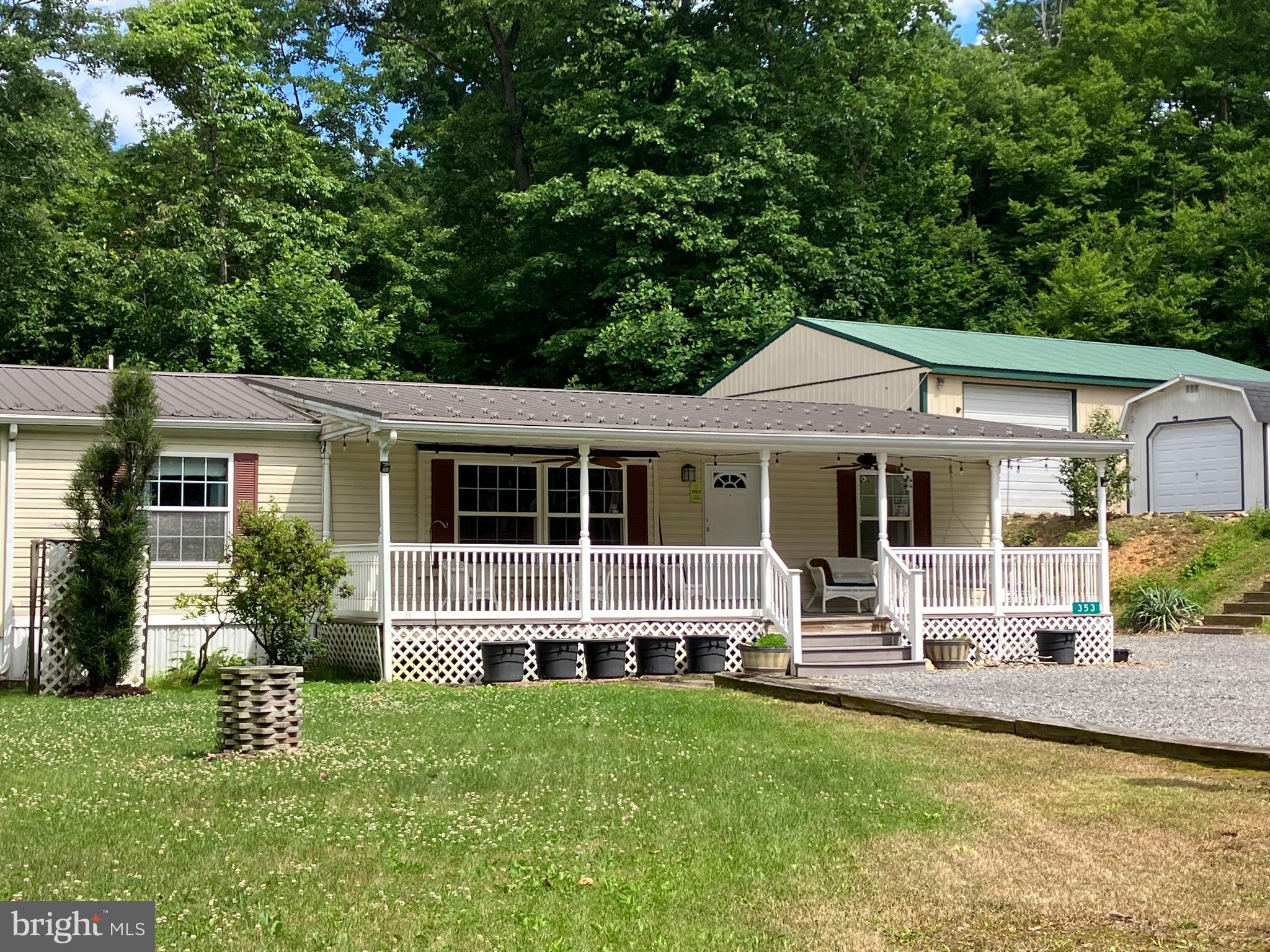 Secluded rural property with a private right-of-way driveway and direct access to State Game Lands 281 along the rear of the property line. This well maintained 3 bed, 2 bath manufactured home was built in 2002 and features a great room with propane stove, metal roof, and vinyl siding. 

The property includes a pole barn, tool shed, chicken coop, and duck coops, offering plenty of space for storage, hobbies, or small-scale homesteading. Additionally has two owned 120-gallon propane tanks, high quality Kinetico water treatment system, a Rinnai tankless water heater, an RV hookup, and a whole house generator.

Bordering State Game Lands and surrounded by nature, don't miss out on the opportunity to swing on the front porch of this sweet country home.