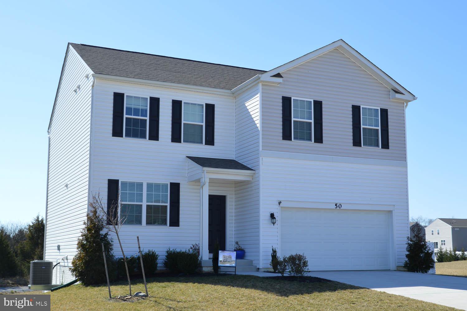 3-year old 4-bedroom, 2 1/2 bath single-family home backing to open space.  Large open kitchen/dining/family room with slider to large rear deck.  Formal living room off foyer with half bath.  Large main bedroom with full bath (large tiled shower), with three secondary bedrooms and full hall bath.   Upper floor and stairs are carpeting.  Large lower level rec room with slider.  Two large storage rooms.  Property managed by Dwellworks LLC.  Application is easy 2-stage process.  Minimum credit score of 640+ required.  Minimum annual income of $98,000+ required.  Application process takes 2-5 days on average.  2-year lease okay.