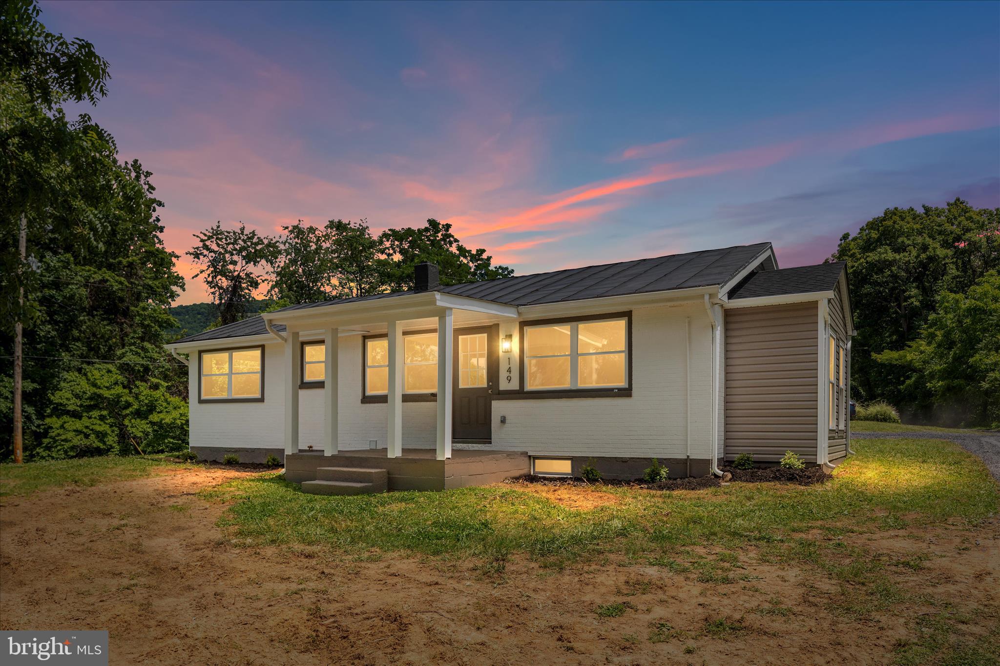 Welcome to 149 Sassy Lane, a thoughtfully renovated home on 2.5 acres where quality craftsmanship and attention to detail take center stage. This 2-bedroom, 1-bath property has been completely rebuilt with longevity in mind, including new electrical, plumbing, HVAC, roof, windows, kitchen, bathroom, and a newly added exterior entrance to the basement.

Some renovations do the minimum. This one didn't.

From the major systems behind the walls to the finishes throughout the home, every improvement was carefully planned and executed to create a property that feels truly new. The quality of the work is evident not only in the updates themselves, but in the thoughtful design choices made along the way.

The kitchen serves as the centerpiece of the home, featuring granite countertops, stainless steel appliances, floating shelves, and ample cabinetry that blends style with functionality. Just off the kitchen, the sunroom provides additional living space and fills the home with natural light, creating an open and inviting atmosphere throughout the day.

Outside, the property offers a rare combination of privacy, usable land, and convenience. Set on 2.5 partially wooded acres with mountain and pastoral views, there is plenty of room to enjoy the outdoors while remaining just minutes from downtown Front Royal, Skyline Drive, and the Shenandoah River.

With luxury vinyl plank flooring, a fully renovated bathroom, two comfortable bedrooms, updated systems throughout, and nothing left to do but move in, this is the kind of property buyers hope to find but rarely do. Whether you're looking for a primary residence, weekend retreat, or a home that can serve as a long-term investment, 149 Sassy Lane offers a level of quality and peace of mind that is difficult to replicate.