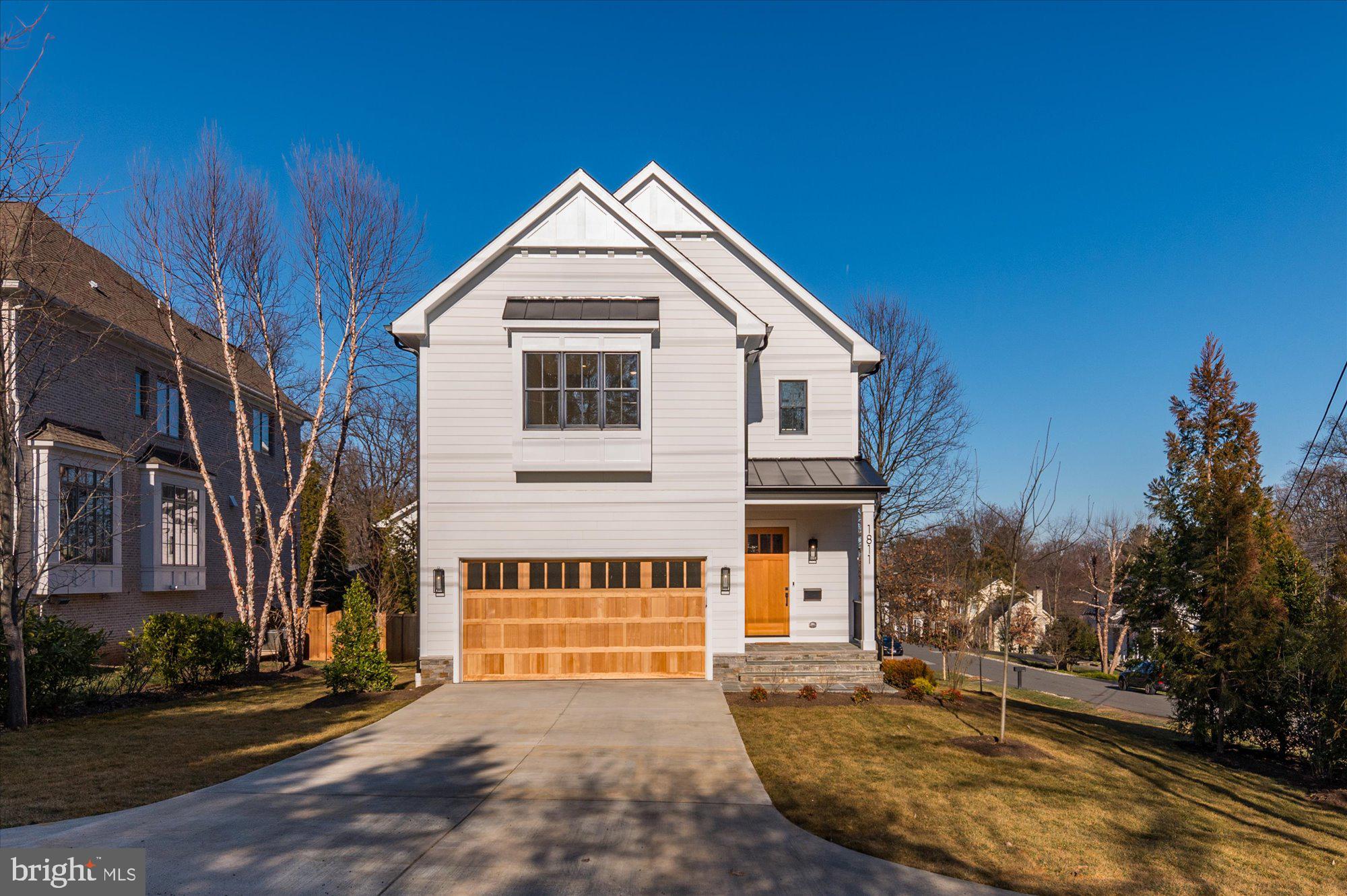 Finished and ready to move in! M-R Custom Homes presents this beautiful new custom home in Franklin Park. This home features 6 bedrooms, 6 full bathrooms, and one powder room with 5,287 square feet of finished living space on four levels and beautiful wide-plank, white oak engineered wood floors throughout the main and upper levels. The main level includes 10ft ceilings, and a beautiful gourmet kitchen with wood-stained custom cabinetry, quartz countertops, 42" Subzero paneled refrigerator, and 48" Wolf Range. The kitchen and breakfast nook open to the great room with coffered ceiling, built-ins, and a gas fireplace with tile and shiplap surround. Through the butler’s pantry is an elegant formal dining room with abundant natural light. The large rear screened porch with heaters and speakers offers an amazing outdoor living space overlooking the backyard and has an attached deck that is perfect for grilling. A private study, mud room with built-in cubbies, and an attached two-car garage complete the main level. The upper level is highlighted by a luxurious primary suite with dual walk-in closets with built-ins, a spa-like bathroom with heated floors, double vanities, stand-alone soaking tub, and heavy glass enclosed shower with wall mounted and rain shower heads. The 3rd floor loft, with full bathroom, is perfect for a private office, guest suite, or play area. The basement includes a spacious recreation room, exercise room, a finished storage room, and a bedroom with full bathroom. Convenient to Chesterbrook Elementary, Chesterbrook Swim and Tennis Club and Chesterbrook Shopping Center. Chesterbrook ES/ Longfellow MS/ McLean HS.