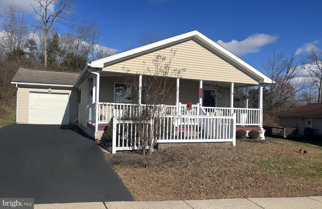 Here is your chance to get into Douglass Village! Charming Rancher in Desirable 55+ Community! 🏡
Welcome home to this well-maintained 2-bedroom, 2-bath rancher offering comfortable, one-floor living in a sought-after 55+ community. This inviting home features an open layout perfect for everyday living and entertaining.
Enjoy the convenience of an attached garage 🚗 and relax on your covered porch ☕🌿—the perfect spot for morning coffee or evening unwinding.
The spacious primary suite includes a private bath and generous closet space, while the second bedroom is ideal for guests, a home office, or hobby room.
Located close to shopping, dining, medical facilities, and major roadways, everything you need is just minutes away!  


As a Community Owner We Provide/What is Included in Lot Rent:
Mowing/Blowing/Trimming (Weed Whacking) of every home
Snow Plowing from all roads and public sidewalks
Trash Removal on a weekly basis
Amenities: Clubhouse, Pool, Gym, Game Room and Library

Come look at this fantastic property today and make it your forever home!