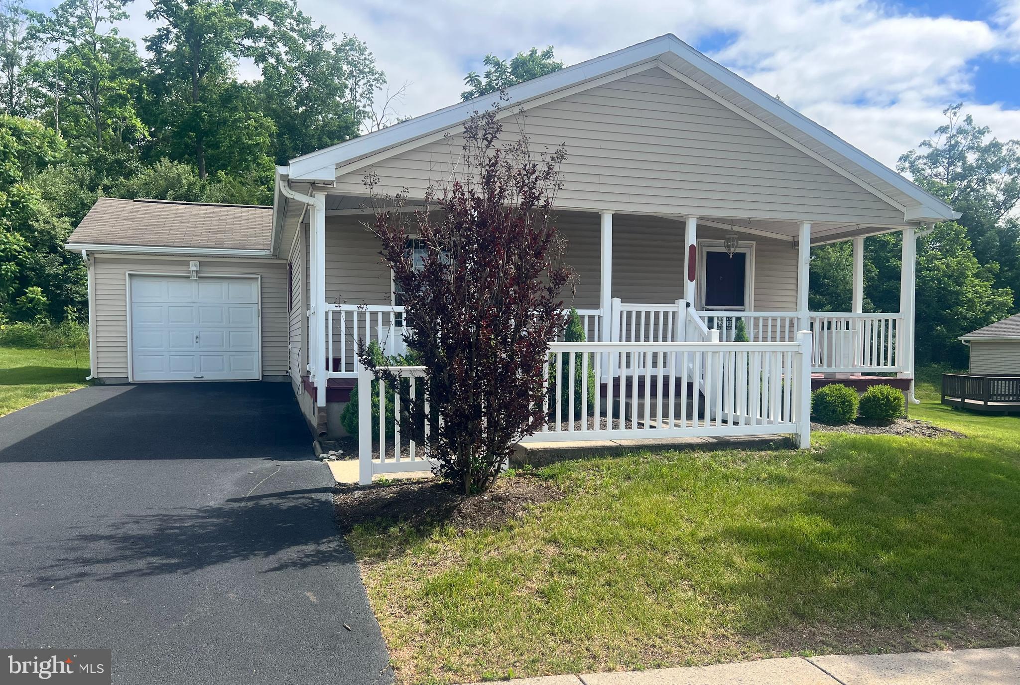 Back on Market due to nothing of the sellers fault.. 
Here is your chance to get into Douglass Village! Charming Rancher in Desirable 55+ Community! 🏡
Welcome home to this well-maintained 2-bedroom, 2-bath rancher offering comfortable, one-floor living in a sought-after 55+ community. This inviting home features an open layout perfect for everyday living and entertaining.
Enjoy the convenience of an attached garage 🚗 and relax on your covered porch ☕🌿—the perfect spot for morning coffee or evening unwinding.
The spacious primary suite includes a private bath and generous closet space, while the second bedroom is ideal for guests, a home office, or hobby room.
Located close to shopping, dining, medical facilities, and major roadways, everything you need is just minutes away!  
As a Community Owner We Provide/What is Included in Lot Rent:
Mowing/Blowing/Trimming (Weed Whacking) of every home
Snow Plowing from all roads and public sidewalks
Trash Removal on a weekly basis
Amenities: Clubhouse, Pool, Gym, Game Room and Library

Come look at this fantastic property today and make it your forever home!