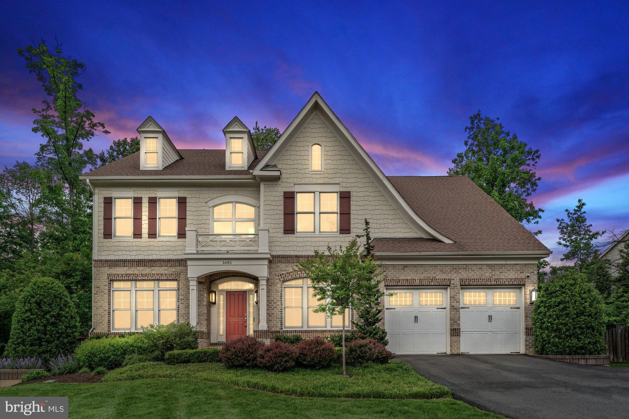 Welcome to this exquisite Craftsman style residence with 5 bedrooms, 4.5 baths and 5,204 finished square feet across three levels  on a 0.36 acre lot! This home is where timeless charm meets modern luxury in one of Northern Virginia’s most desirable communities and on a quiet cul-de-sac. The main level showcases gleaming hardwood floors, 10 foot ceilings, detailed trim work, a formal dining room, a refined living room, and a sun drenched family room. At the heart of the home, the gourmet kitchen is a chef’s dream featuring custom white cabinetry, granite countertops, stainless steel appliances from GE Monogram and Bosch, double ovens, a spacious island, walk in pantry, Miele built in coffee machine, and a well appointed butler’s pantry. Also on this level are a private home office, mudroom with built in storage, and convenient half bath. Upstairs, the expansive primary suite offers a peaceful retreat with a tray ceiling, private sitting area, and dual walk in closets. The luxurious marble bathroom includes a soaking tub, frameless glass shower, and dual vanities. Additional bedrooms include en-suite or Jack and Jill access to full baths. The walk out lower level is an entertainer’s paradise complete with custom bar with wood accents, stone accented recreation room with fireplace, dedicated home gym, custom home theater, additional bedroom, and full bath. Step outside to your private backyard sanctuary featuring flagstone patio, English garden with gazebo, built-in fire pit, grill station, and mature landscaping. This home also features a two car garage with one space pre-wired for electric car charging and a third space for parking on the driveway. Home automation system in place and can be serviced through ADT which allows for remote security monitoring. Ideally located just minutes from downtown Vienna, the W&OD Trail, Tysons Corner, Metro access, and major commuter routes. Westbriar/Kilmer/Marshall pyramid.