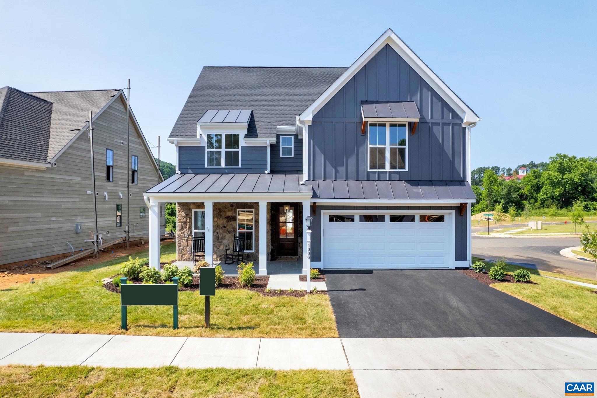 ACTUAL MODEL HOME PHOTOS SHOWN! Mountain Views, minutes from Downtown, UVa, I-64, Wegmans, Monticello, Carters Mountain and so much more. The Mechum features a light-filled, open-concept kitchen and great room, walk-in pantry, mud room, dedicated study, 4 bedrooms, Jack and Jill bath, luxurious owner's suite in addition to a FINISHED 3RD FLOOR REC ROOM with optional full bath. 2-car garage included. Quality features throughout including bluestone front porch and patio, 2x6 exterior walls, R-19 insulation, Pella windows, custom Mahogany front door, wood shelving throughout, 16 SEER HVAC with separate zones for each floor, Tankless water heater with recirculating line and so much more. Each home is tested for energy efficiency and HERS Score.,Granite Counter,Wood Cabinets,Fireplace in Great Room