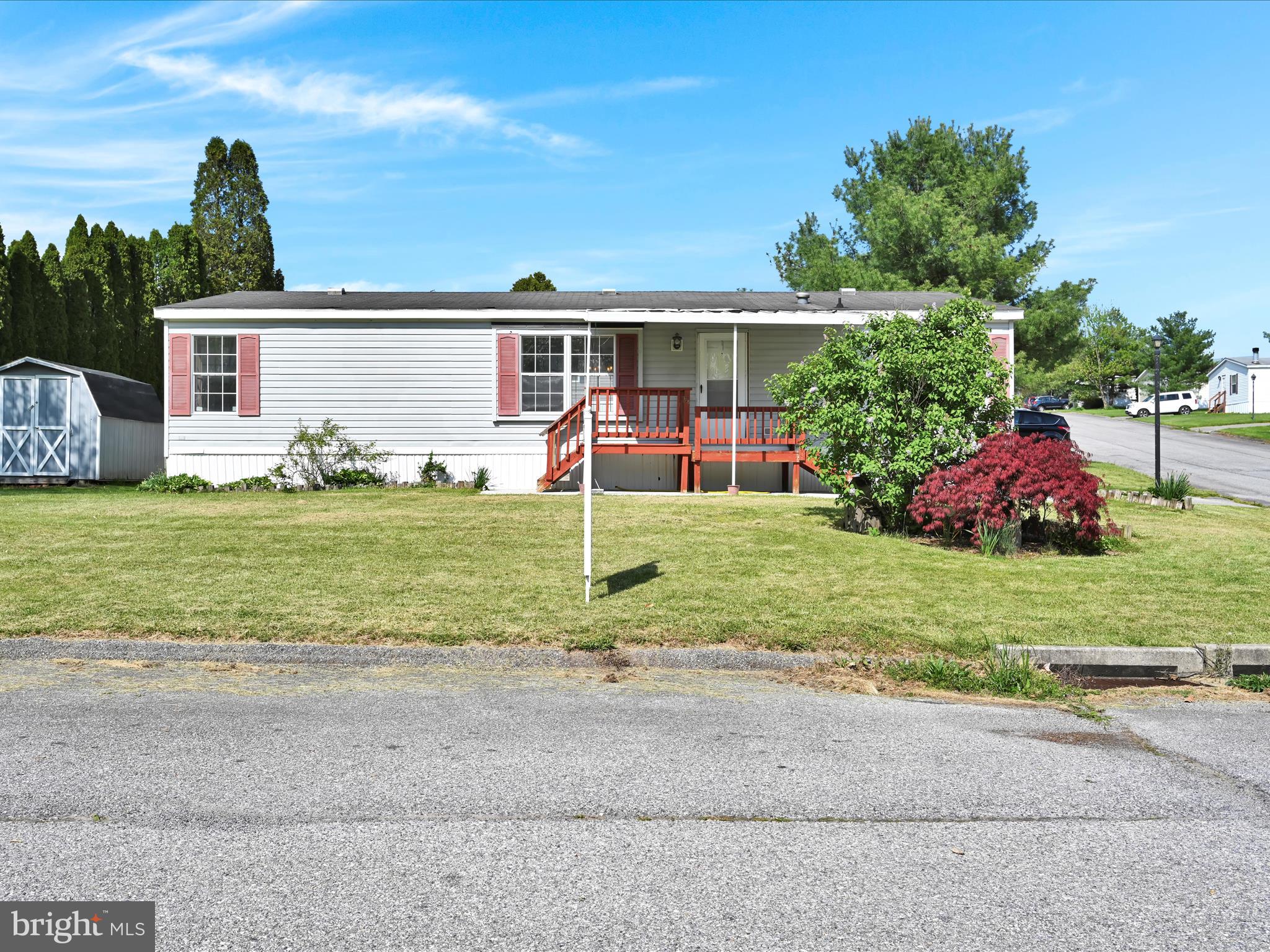 4 BR 2 BA double wide in Northeastern School district in the popular neighborhood of Newberry Farms.  The lot rent includes, sewer and trash and snow maintenance for the roads. This home has lots of room with 4 BR and 2 full baths all on one level. The rooms are spacious there are sliding glass door which lead to the deck and back yard. the home also has a shed. There is a primary BR with Primary BA. This home is move in ready. Schedule your showing today!
