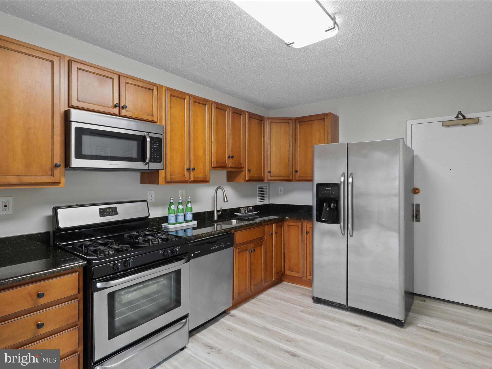 This move-in-ready unit features updated kitchen cabinets and stainless steel Frigidaire appliances and new GFCI outlets, along with a Kenmore washer and dryer. The entire residence boasts brand-new, high-quality waterproof rigid core vinyl luxury flooring along w/ 5'5 baseboards and shoe molding, new convectors, new cellular blinds & GFCI kitchen outlets, LED light fixtures, and a professionally painted interior in light "Crushed Ice" with an "Ultra White" ceiling. The bathroom has also been modernized. ​Enjoy a breathtaking view of the U.S. Capitol’s majestic dome, the striking Air Force Memorial, and the towering Washington Monument, blending history and architecture against the Washington, D.C. skyline​. Ideally located just minutes from Shirlington, BRAC, Pentagon City, Amazon HQ2, the West Alex development, Ballston Quarter, Old Town Alexandria, downtown Washington, D.C., I-395, I-495, and Ronald Reagan National Airport, this property sits in the heart of Northern Virginia, offering a convenient lifestyle in a serene environment. Envisioned by developer Charles E. Smith in the early 1970s, Skyline, located in the historic Bailey’s Crossroads section of Falls Church, provides a complete living experience with dining, shopping, work, and recreational options all within a short distance. Enjoy an easy commute to Washington, D.C., the Pentagon, and throughout Northern Virginia. Skyline Plaza enhances this lifestyle with amenities including a convenience store, dry cleaning, hair salon, USPS services, medical office, beauty parlor, party room, playground, bike storage, and a shuttle to the Pentagon and Metro bus. The condo fee includes all utilities. Act quickly to secure this exceptional property!