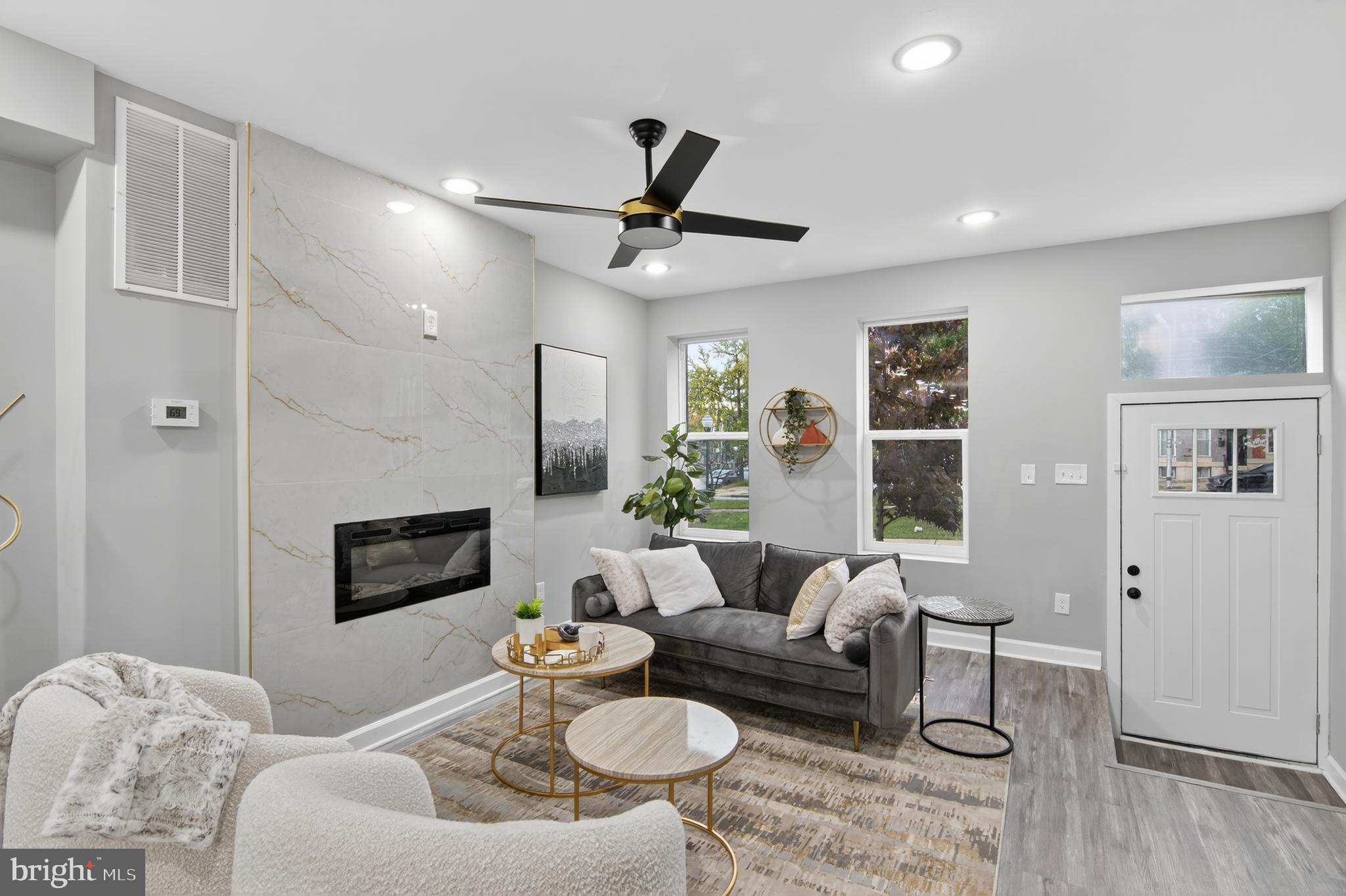 OWN FOR LESS THAN RENT!
FULLY REIMAGINED 4BR/4.5BA HOME JUST MINUTES FROM JOHNS HOPKINS, DOWNTOWN BALTIMORE & MAJOR EMPLOYMENT HUBS! 

Designed for modern city living, this beautifully updated property offers exceptional flexibility, functionality, and long-term value in one of Baltimore’s rapidly developing corridors. Featuring dual HVAC systems, multiple laundry areas, a stylish primary suite, and a private lower-level suite with a separate entrance, this home is ideal for extended family,  extended guest space, traveling professionals, travel nurses, OR  potential additional income. Eligible buyers may qualify for Maryland down payment assistance programs.

The versatile lower-level setup creates exciting possibilities for Airbnb use, traveling nurse accommodations, JHU-related rental demand, home office space, or additional living quarters to help offset monthly mortgage expenses.

Thoughtfully updated throughout with modern finishes and a flexible layout that adapts to today’s lifestyle needs, this home stands out as a strong value compared to recently renovated sales in the area.

Conveniently located near Johns Hopkins Hospital, Downtown Baltimore, major commuter routes, dining, entertainment, and neighborhood revitalization projects. Eligible buyers may also benefit from various grant and homeownership assistance programs.

AFFORDABILITY * HOUSE HACKING * JOHNS HOPKINS PROXIMITY * DOWN PAYMENT ASSISTANCE