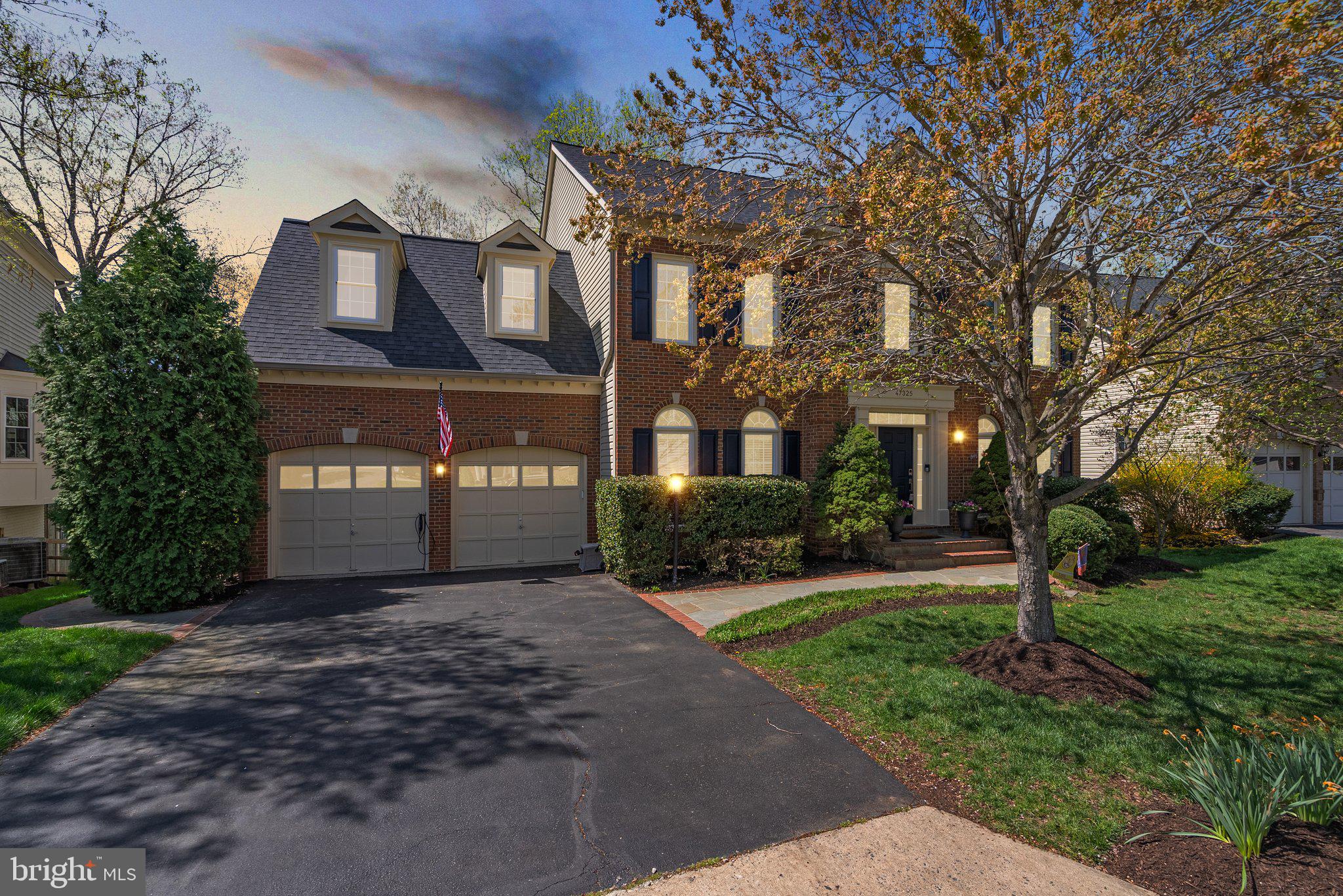 Timeless Luxury in Rivercrest – Where Elegance Meets Innovation
Welcome to an exceptional estate nestled on a 0.39-acre private lot backing to towering trees and a tranquil stream—a rare sanctuary in the prestigious Rivercrest community (20165). This refined, upgraded residence offers an unparalleled blend of classic craftsmanship and modern sophistication, appealing to buyers who demand excellence in both form and function.
Walk up the elegant brick sidewalk to step inside your dream home.  A stately two story entry greets you with a stunning chandelier hanging over the grand staircase and custom millwork.   The light-filled dining room with custom plantation shutters is spacious enough for the largest of dinner parties.  A butler’s pantry bridges the gap between everyday living and elegant entertaining,  Work from home? The main floor office allows for compete organization to keep you productive all day.  Need a break?  The attached formal living room provides a quiet space to relax and read.  
At the heart of the home, the chef’s gourmet kitchen is a showpiece—equipped with professional-grade stainless steel appliances, sleek quartz countertops, timeless white cabinets, and large island provide an abundance of prep space, while a custom-designed coffee bar adds a boutique-hotel flair to your mornings.  The adjoining sunroom floods the space with natural light and views of the surrounding woodlands, creating a seamless indoor-outdoor flow.   The kitchen also opens to the family room with its Magnolia-like style using built-in shelving and custom millwork giving it so much character and charm.  
Step outside to the expansive screened-in porch—a perfect setting for al fresco dining or quiet reflection, with unobstructed views of nature's beauty.  You can hear the stream in the background harmonizing with the melodic songs of the birds.  
The primary suite is nothing short of a private retreat, featuring a spacious sitting room, spa style bath, and serene wooded views. The considerably sized walk-in closet with well planned organizers is a dream. Down the hall, you’ll find three additional generously sized bedrooms, including one with custom built-ins—ideal for a study or flex space—and two more full bathrooms, one of which is ensuite for added comfort and privacy.  So many great add ons to these bedrooms make them anything but standard.  Beautiful hardwoods, built-ins and window treatments complete each space.
The fully finished, walk-out lower level is designed for entertaining at scale, with ample space for a game room, media lounge, or fitness studio. A wealth of custom storage solutions and organizational systems throughout the home ensures a clutter-free, elevated lifestyle. Walk outside to the flagstone patio or the dry deck overlooking the picturesque, large, usable back yard.  Sit and take in all of nature's beauty.
Almost every inch of this home has been meticulously updated with high-end finishes and thoughtful details. Brand-new dual-zone furnaces, fresh designer paint, and new plush carpet in the family and lower levels complement the expansive hardwood floors throughout both upper levels, setting the stage for a home that is as stylish as it is comfortable. Additional updates include an A/C unit, roof and all windows and doors.  Every detail has been considered, including exquisite millwork, a whole-home Google Smart System with integrated Sonos in nearly every room, and EV charging capability—ideal for the buyer who demands the best. 
This is more than a home—it’s a statement of refined living in one of Northern Virginia’s most sought-after neighborhoods. Opportunities like this are exceedingly rare.