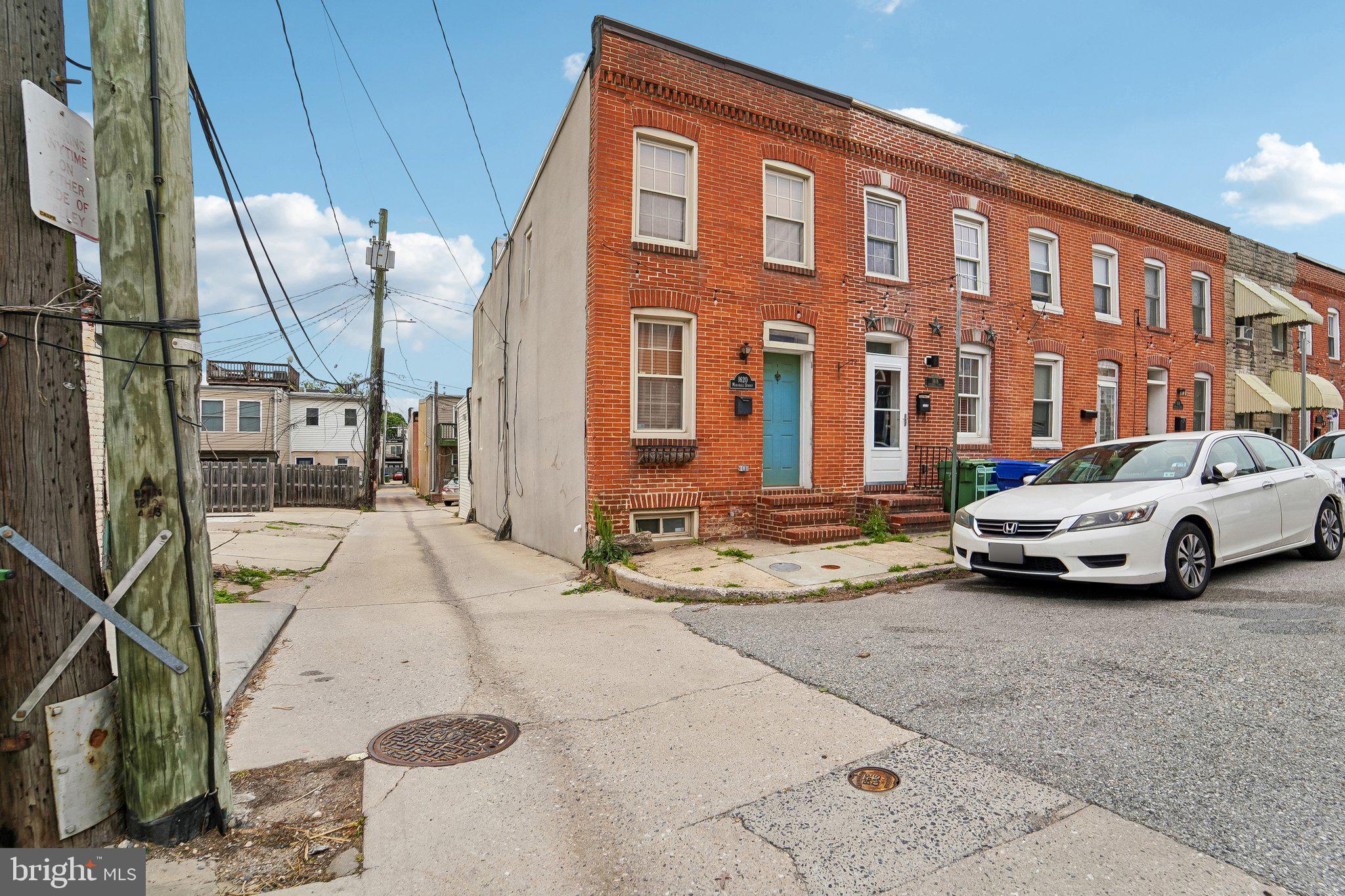 Major price adjustment! This end-of-group Federal Hill row-home hits that sweet spot—just the right amount of space for efficient, clutter-free living. Tons of windows bring in natural light, so every room feels bright and open. The front office/parlor is perfect for a work-from-home setup or study space. The main level flows nicely with defined living and dining areas, plus a convenient powder room. The kitchen is clean and modern—white cabinetry, ceramic plank tile floors, stainless steel appliances, and a sharp glass tile backsplash. Upstairs you’ve got two comfortable bedrooms and a spacious full bath. The lower level is full, dry, and gives you all the storage you need, along with the laundry area. Freshly painted too! And the kicker—easy parking with your own end-unit parking pad. Better hurry! Mortgage savings may be available for buyers of this listing.