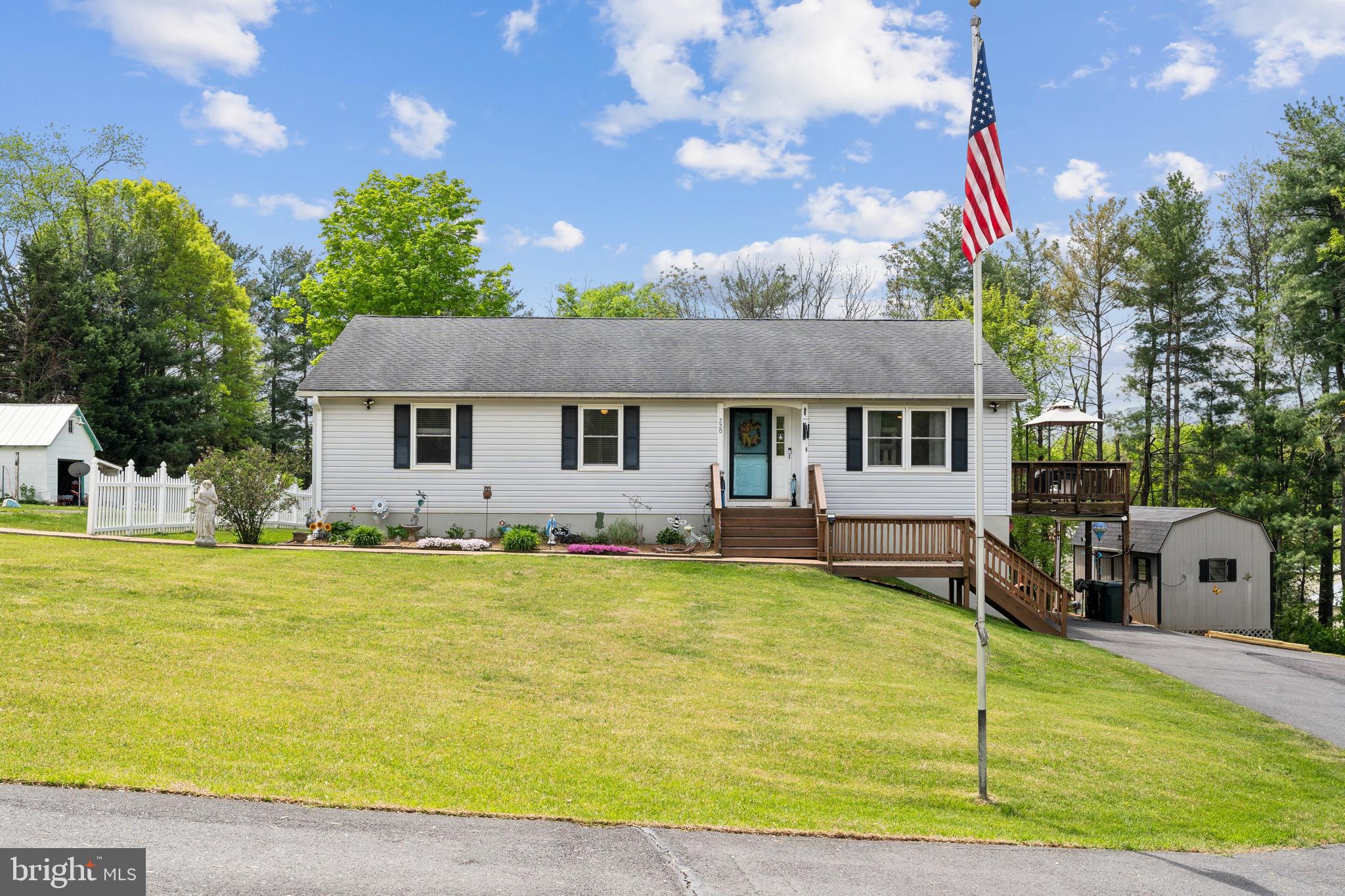 Immaculate Move-In Ready Ranch – No HOA!

Welcome to this beautifully maintained ranch-style home, nestled in a peaceful, well-established neighborhood with no HOA restrictions. This property offers the perfect blend of comfort, convenience, and privacy, all just minutes away and within walking distance from the heart of downtown Culpeper.

Inside, the home features an open and airy floor plan. The kitchen is a cook’s dream with stainless steel appliances, a central island with bar seating, and a spacious adjoining dining room accented by elegant chair rails. The bright and inviting family room provides the perfect space for relaxation and gatherings.

The main-level primary suite includes a fully renovated bathroom and two custom closets, including a spacious walk-in closet. An additional office, bedroom, and full bathroom are also located on the main floor, offering convenience and flexibility.

Downstairs, the fully finished basement features a large recreation and flex space, ideal for entertaining, hobbies, or a home gym. One wall is even equipped for indoor climbing! The basement also features two additional bedrooms and another full bathroom, making it perfect for guests or multi-generational living.

Outdoor living is equally impressive with two decks that offer serene views of the Blue Ridge Mountains—ideal for enjoying morning coffee or evening sunsets, especially in the fall and spring. The property is surrounded by mature trees on three sides, providing privacy and a daily front-row seat to local wildlife, including deer, foxes, wild turkeys, and red-tailed hawks.

Located within walking distance to downtown Culpeper, you'll have easy access to shopping, dining, the Amtrak station, the Farmers Market, local breweries, and more. Just two doors down is Windmill Heights Greenhouses for all your gardening needs. You're also minutes from two grocery stores, the local hospital, and Route 29 for quick access to Northern Virginia or Charlottesville. Dulles Airport is just an hour away, with Fredericksburg and Lake Anna both within a 45-minute drive.

This home offers a rare combination of tranquility, space, and accessibility. With so much to love, it won’t stay on the market long—schedule your showing today!