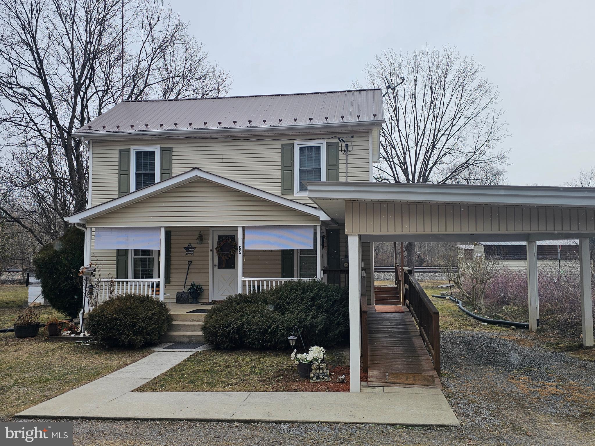 CLOSE TO THE POTOMAC RIVER:  Check out this adorable, well maintained 3-bedroom, 2 bath 1900's home.  This home is located just a couple hundred yards from public access to the scenic Potomac River, so bring your kayak and spend countless days fishing, swimming, or just relaxing on the water.  It is conveniently located less than 30 minutes from Martinsburg and historic Berkeley Springs.  This home has the warm comfortable feel of old-time country living, but with all the modern conveniences for today's lifestyle.  With all the bedrooms, and a full bath on the second floor for privacy, the large den area on the main floor has countless possibilities for you to create a space that best suits your needs.  The basement has both inside and outside access, where you will find the furnace, wood stove, water heater, etc.   
     Outside, this unrestricted property offers just the right amount of space for pets or gardening, while not consuming all your summer days with yard work.