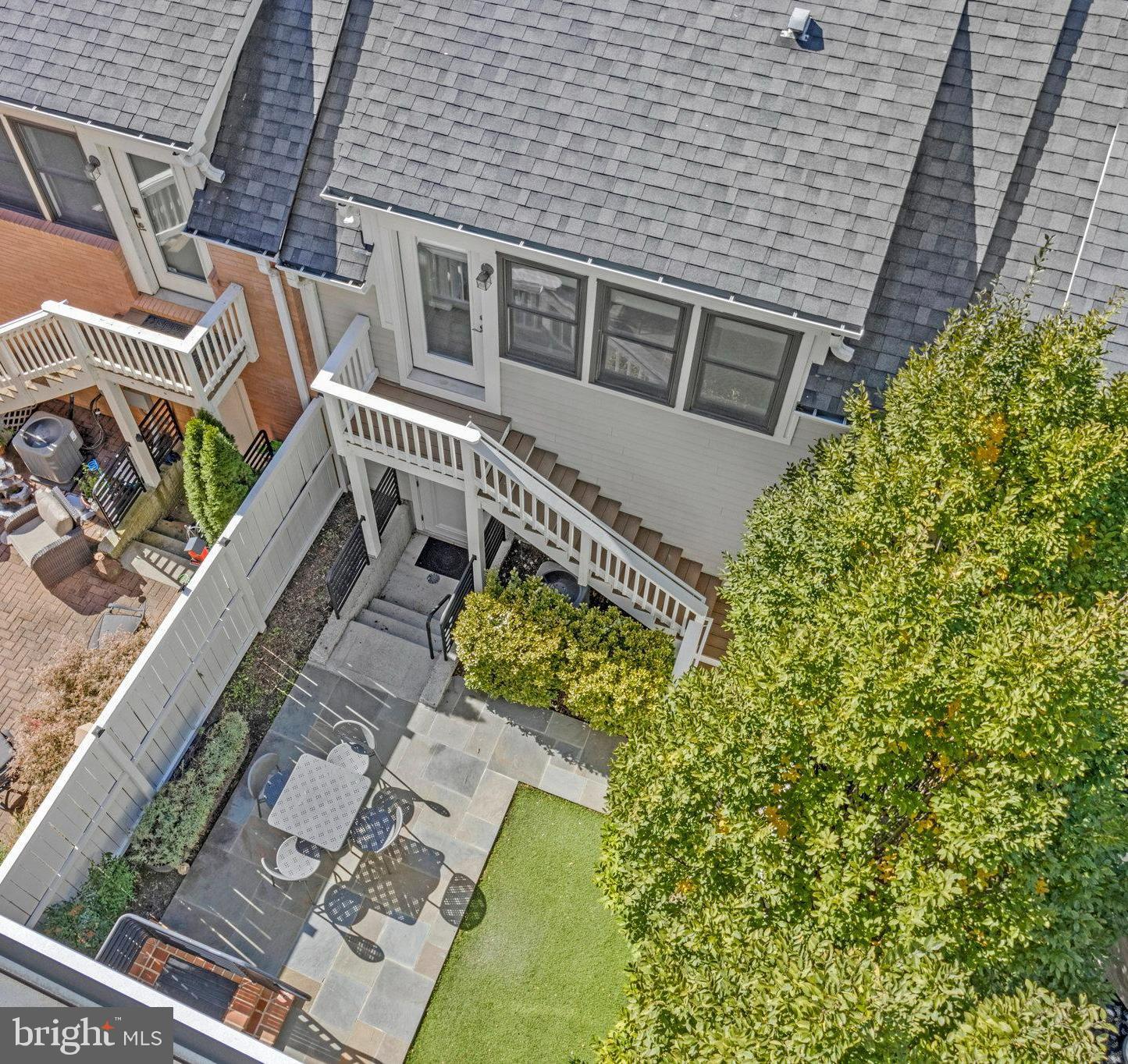 **OPEN HOUSES CANCELLED- But we have more!***
Welcome to 2102 Main Line Blvd, an exceptional executive-style townhome in one of Alexandria’s most sought-after communities — Potomac Yard. This 5-bedroom, 4.5-bath home offers luxurious living space with a rare detached carriage house featuring a 2-car garage and private studio suite above, all connected by a fully fenced courtyard — a layout seldom available in this neighborhood.
Step inside to discover 10-foot ceilings on the main level and 9-foot ceilings throughout, giving every space an open, airy sophistication. The open-concept main level is ideal for entertaining, featuring hardwood floors, updated finishes, and a gourmet kitchen that flows seamlessly to the outdoor patio. Upstairs, brand-new carpet refreshes the bedrooms for a move-in-ready feel.
The primary suite impresses with its 19' x 12' dimensions, two custom closets, and a spa-inspired en suite bath with dual vanities, frameless glass shower with bench, and abundant storage. Two private balconies extend your retreat outdoors off the Primary!  The adjacent bedroom makes a perfect office, nursery, or fitness space, while the third floor boasts two additional bedrooms, a full bath, laundry room nestled between the bedrooms and the  sun-drenched family room.
Head to the fourth floor for a 19' x 9' recreation room  that opens to a stunning rooftop terrace — the ultimate space for entertaining or unwinding both inside and under the stars.
Super low HOA fees of $125/mo, but also unmatched walkability as well— just steps to Del Ray’s shops and restaurants, minutes to Reagan National Airport, and an easy commute to DC via the nearby Potomac Yard Metro (Blue/Yellow lines) that you can walk to! Dash Bus is FREE! 
This home checks every box — style, space, flexibility, and location. Welcome home to 2102 Main Line Blvd — where executive living meets effortless elegance.
