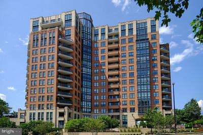 ***STUNNING  Penthouse in the highly sought-after Paramount Condominium! In Reston Town Center! Urban lifestyle living at its finest**
Fantastic  2540 SQFT of luxury living with oversized windows that boast beautiful views from every room!! Can you imagine the  termendous sunsets and incredible nighttime twinkling skies?  This sun filled unit has wide open living/dining space. 3 spacious bedrooms, 3.5 updated bathrooms plus a den/office/library with a gas fireplace.  Lovely chefs kitchen with large breakfast area and  fabulous views for miles. Beautiful Italian Porcelain tile flooring in living, dining rooms and kitchen. This is a  MUST SEE  true penthouse that has TWO private balconies!!! Plus 10' ceilings throught out this very spacious Penthouse!  The Paramount condo has nice amenities which include two exercise rooms, one for aerobic training and one for strengthening.  Lovely swimmming pool, great patio off pool area for your entertaining. Excellent club/party room which leads to the patio for outdoor entertaining. Enjoy the walkable lifestyle with the many new restaurants, must-have shops, the new Look Cinema  and year round entertainment  Walk to the Reston Town Center Metro  or take the Links Shuttle Bus. The Paramount Condo is not only known for their best in Management.  Fee includes all the amenities-gorgeous pool with perfect ambiance, two fitness centers,  one areobic and one strenghting  room, party room, with beautiful patio, guest suite, concierge and security, not to mention snow and trash removal, gas, water,  sewer,  two garage parking  spaces is also included.  Penthouse has 2 deeded garage parking spots + large storage space. Don’t miss out on this ONE-OF-A KIND living that is a perfect combo of Luxury & Charm in the lively Reston Town Center. Come enjoy all the new restaurants and the new Look cinema that have opened recently!
And do not miss out on living with beautiful views of the Blue Ridge Mountains from one balcony and the gorgeous view of Sugarloaf Mountain in Maryland from the other balcony!!
Home has been virtually staged.