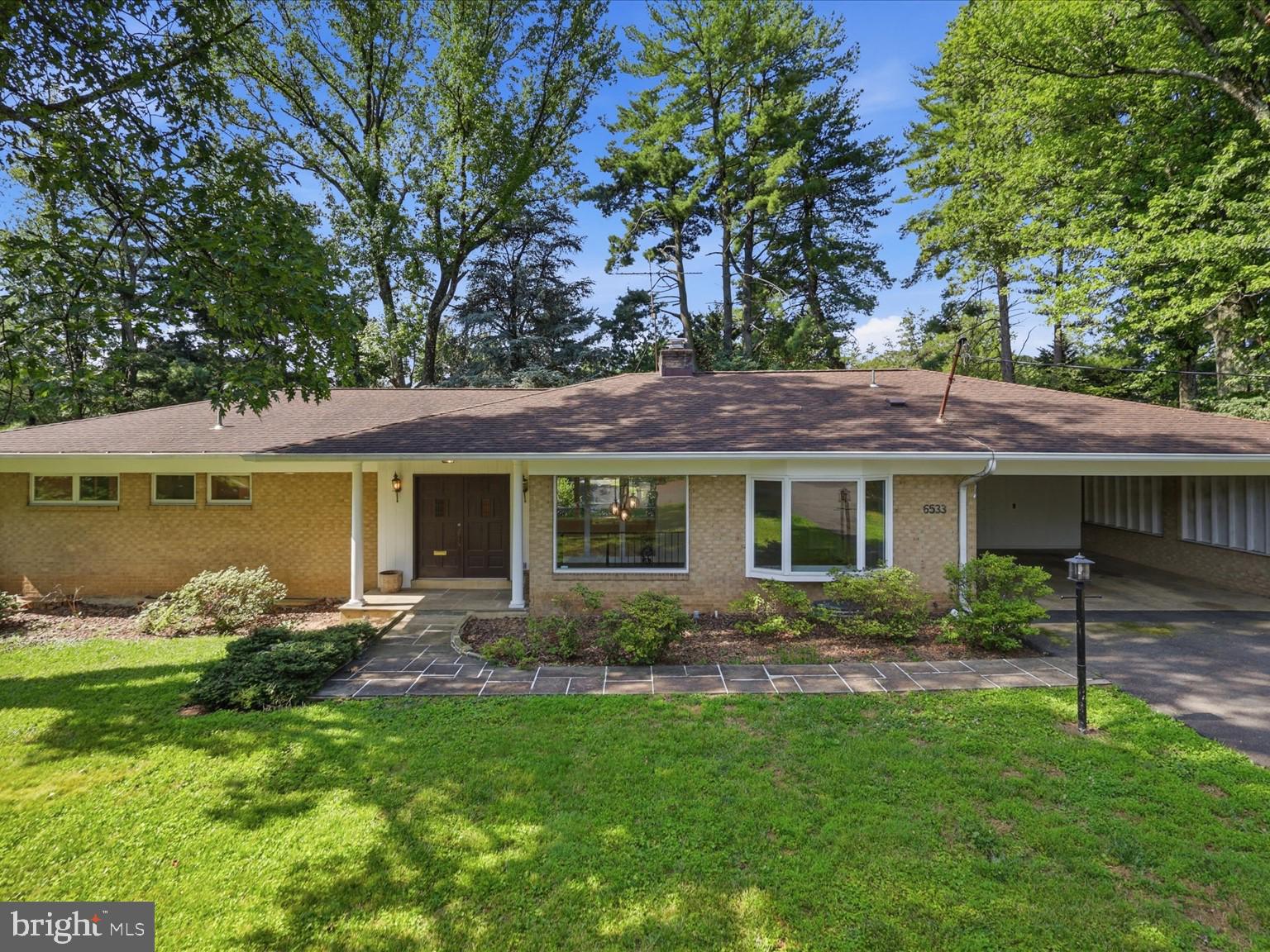 Welcome to this spacious 4-bedroom, 3-bath home on a beautiful .47-acre lot on a quiet cul-de-sac in sought-after Walters Woods in the Sleepy Hallow/Lake Barcroft area. Filled with natural light, this well-maintained home offers generously sized rooms, a flexible floor plan, and endless possibilities to enjoy it as is or renovate to your own taste.

The main level features expansive living and dining rooms, an inviting eat-in kitchen, the primary suite and a second bedroom and hall bath, creating an ideal layout for both everyday living and entertaining. Large windows throughout fill the home with sunshine and showcase the peaceful setting and private backyard.  A very large 2 car carport provides easy access to the home's kitchen - perfect for everyday living.

The walk-out lower level expands the living space with a large family room featuring the home's second fireplace, a wet bar in the game room area, 2 more bedrooms and a full bath.  There is also direct access to a spacious patio—perfect for indoor-outdoor entertaining, relaxing, or creating the ultimate recreation space.

Whether you're looking for a home you can move into and update over time or envision a complete renovation, this property offers a rare opportunity to create your dream home in one of Falls Church's most desirable neighborhoods. Conveniently located near parks, shopping, dining, and major commuter routes, this is a home with exceptional space, timeless appeal, and unlimited potential.